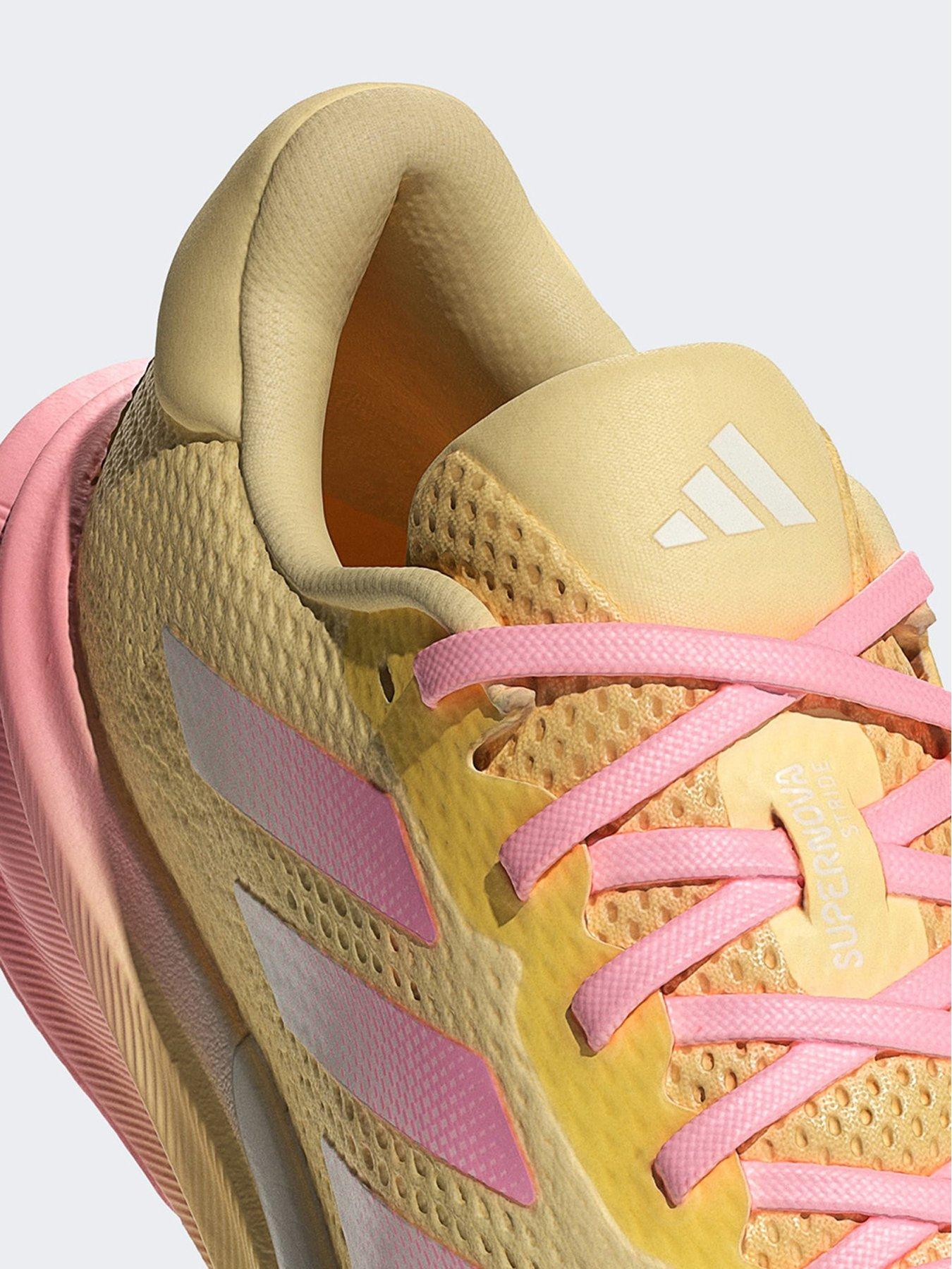  image of adidas-supernova-stride-shoes-yellow