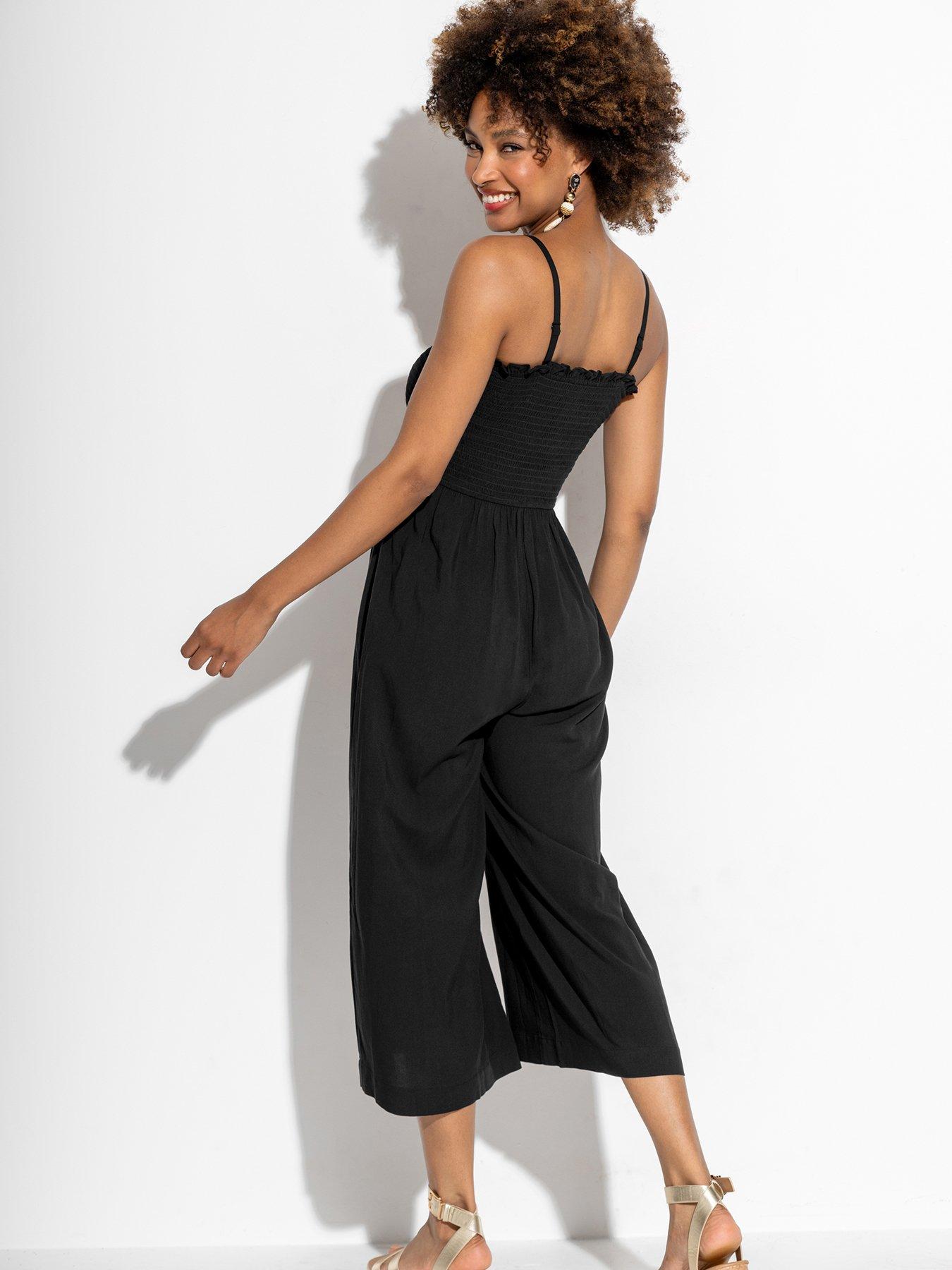 Image 2 of 4 of Pour Moi Strapless Shirred Bodice Crop Leg Beach Jumpsuit - Black
