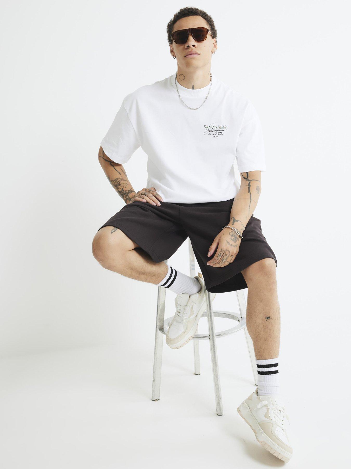 Image 4 of 4 of River Island Oversized Sanctuaire Camouflage T-shirt - White