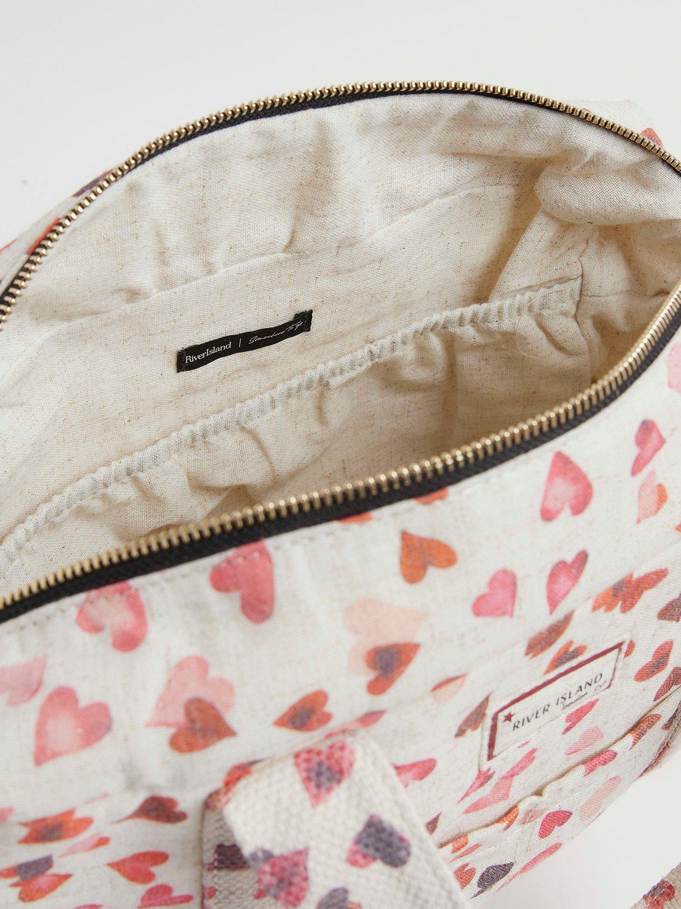Image 4 of 5 of River Island Canvas Heart Print Holdall Bag - Cream