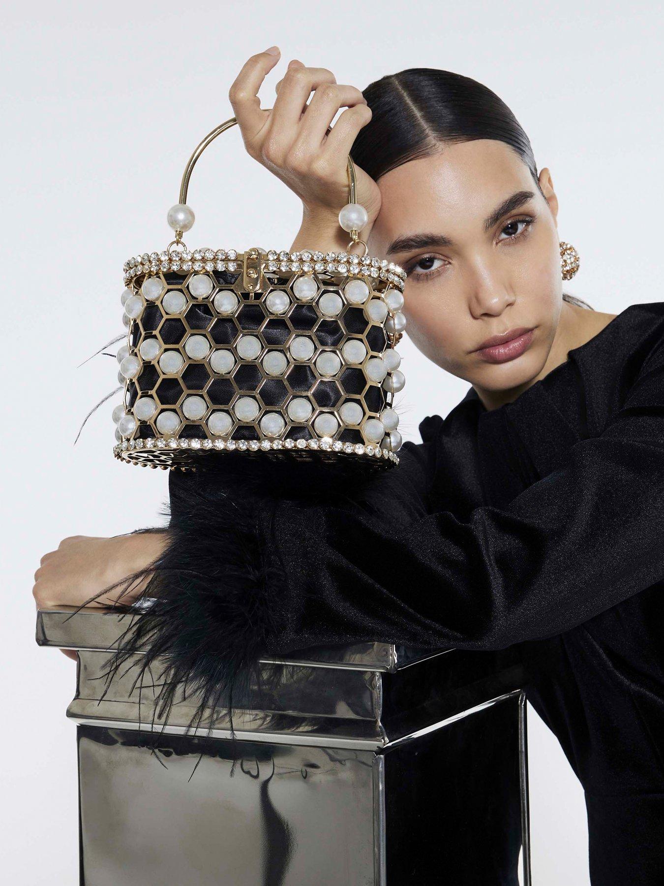 front image of river-island-pearl-cage-basket-clutch-bag-gold