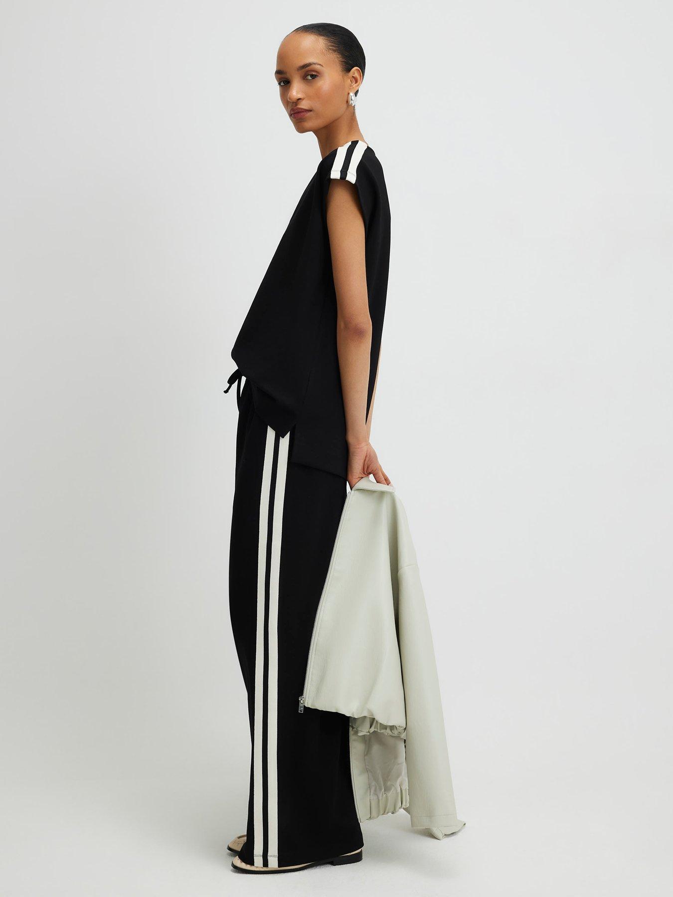 Image 1 of 4 of River Island Side Tape Joggers - Black