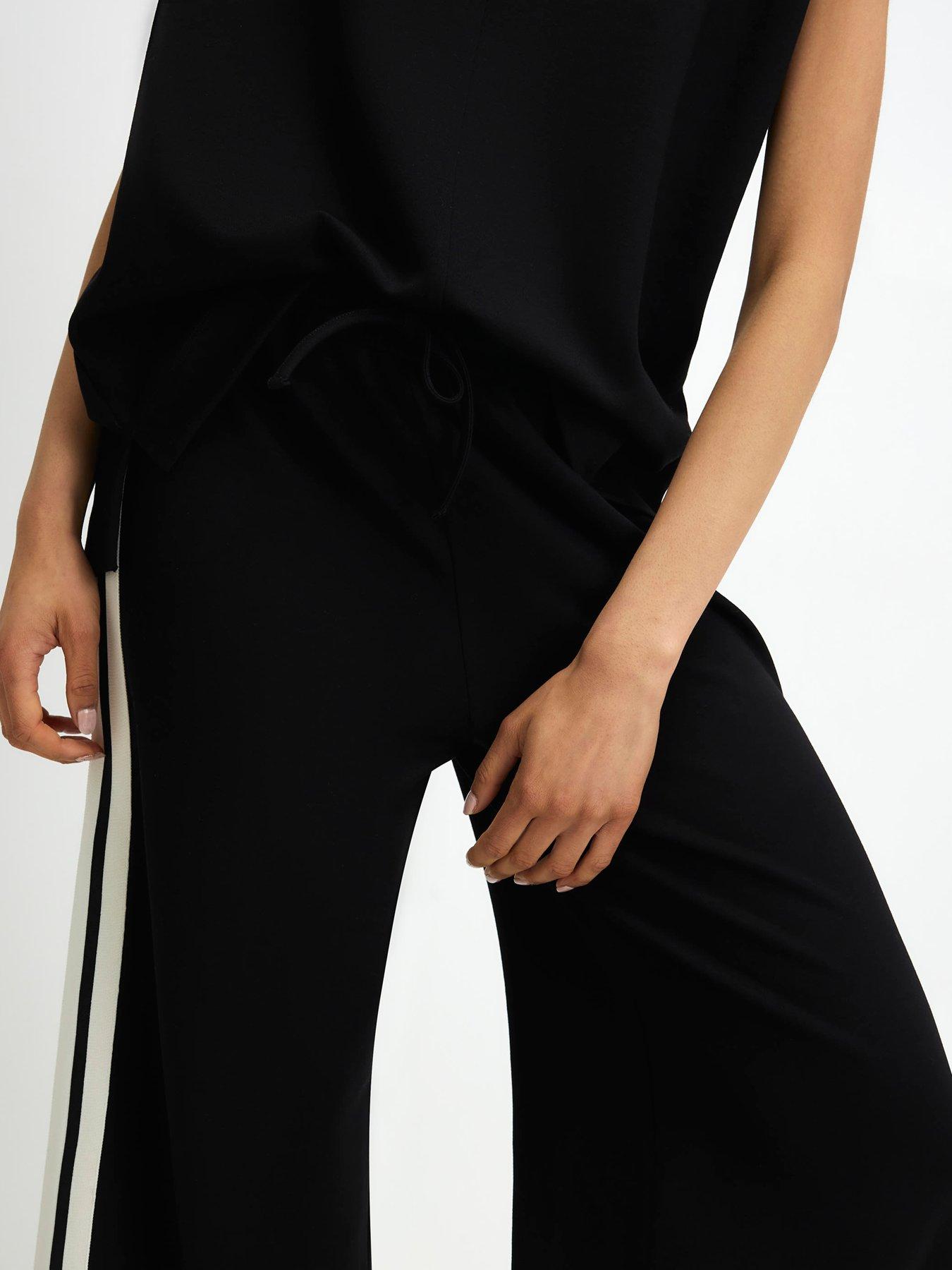 Image 4 of 4 of River Island Side Tape Joggers - Black