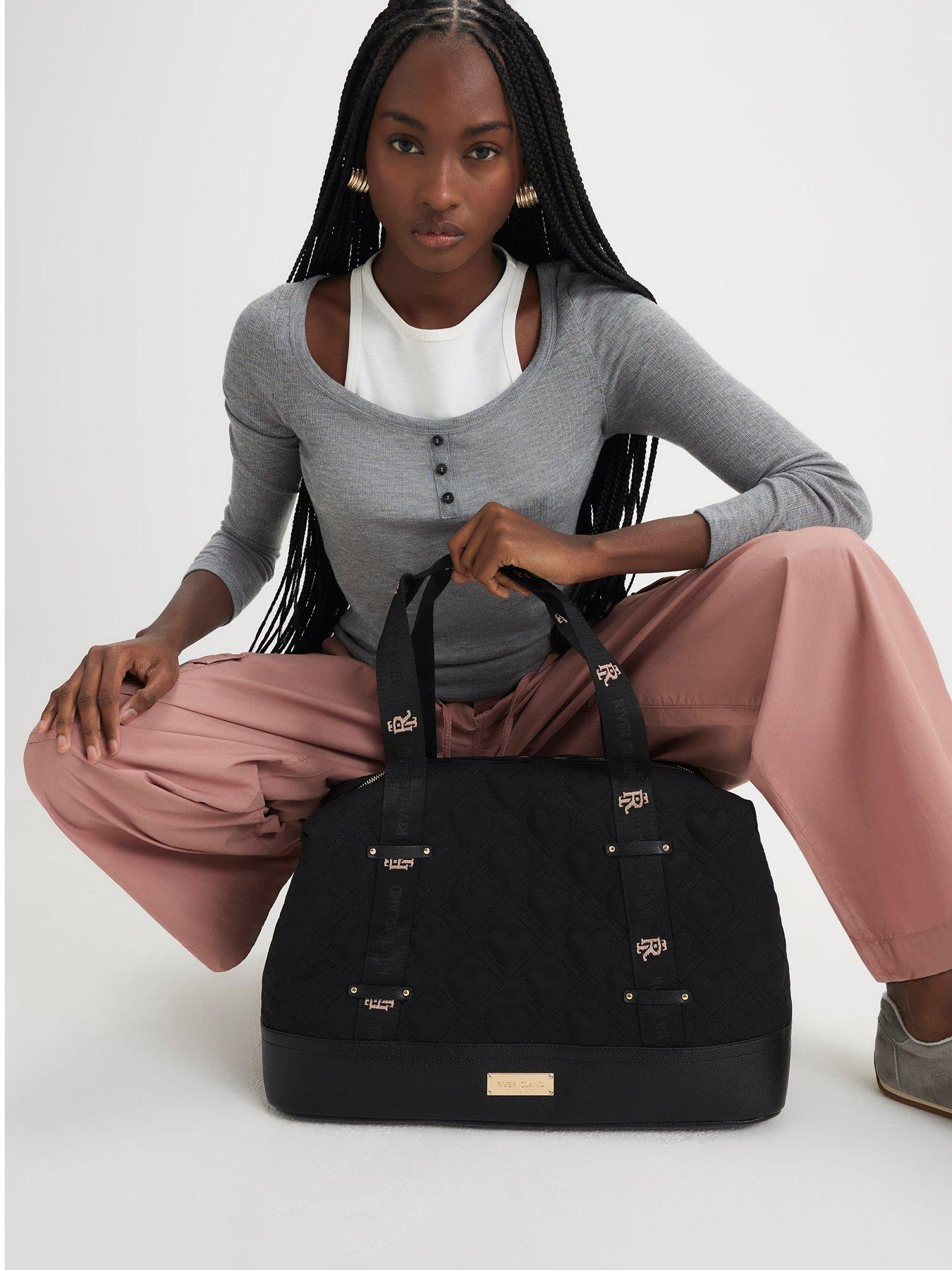 Image 1 of 5 of River Island Heart Quilted Holdall Bag - Black