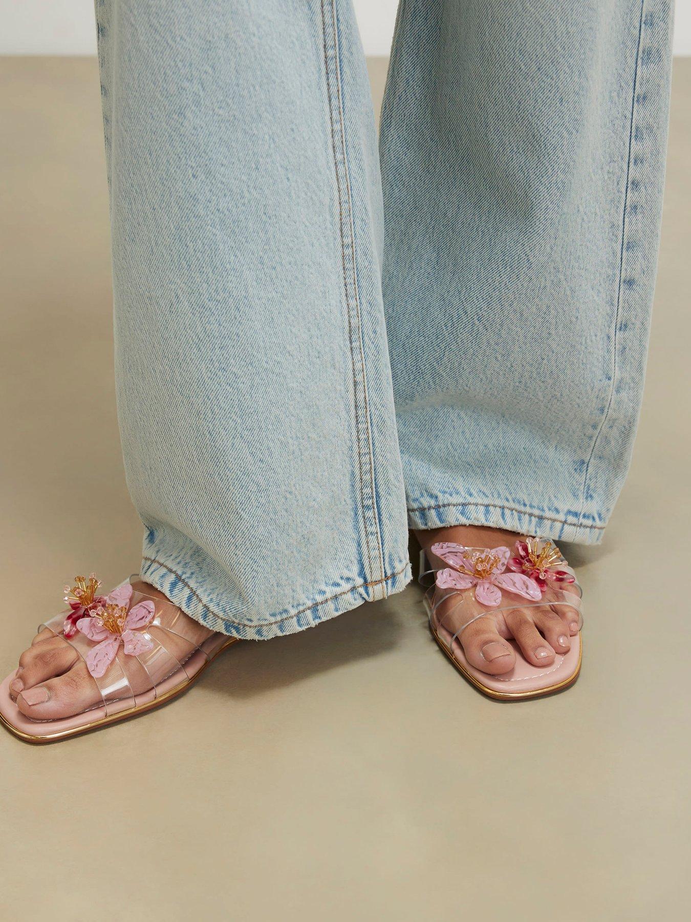 Image 1 of 5 of River Island Perspex Flower Flat Sandals - Pink