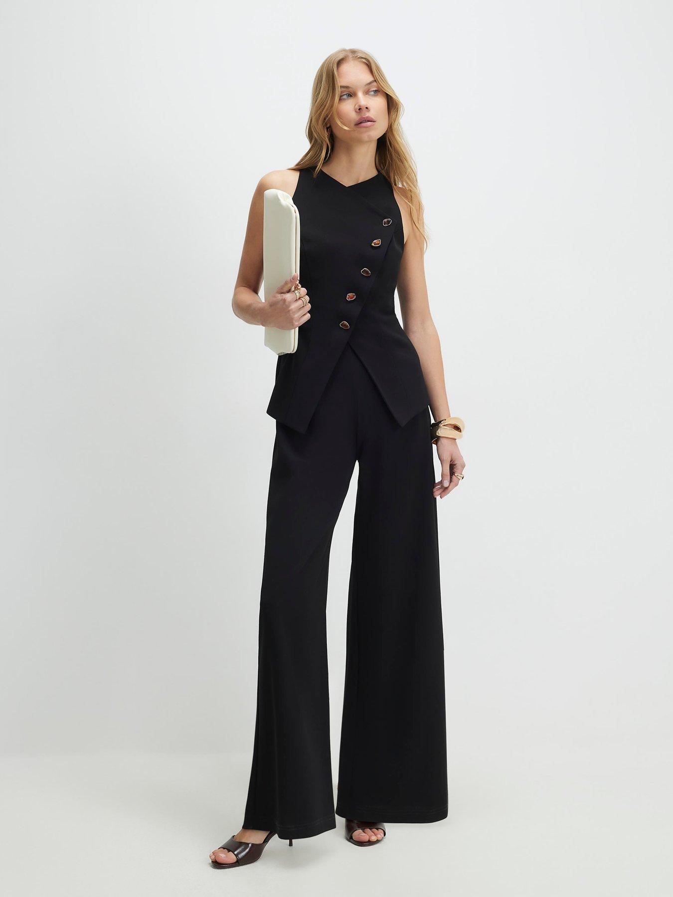 Image 1 of 4 of River Island Collarless Asymmetric Jumpsuit