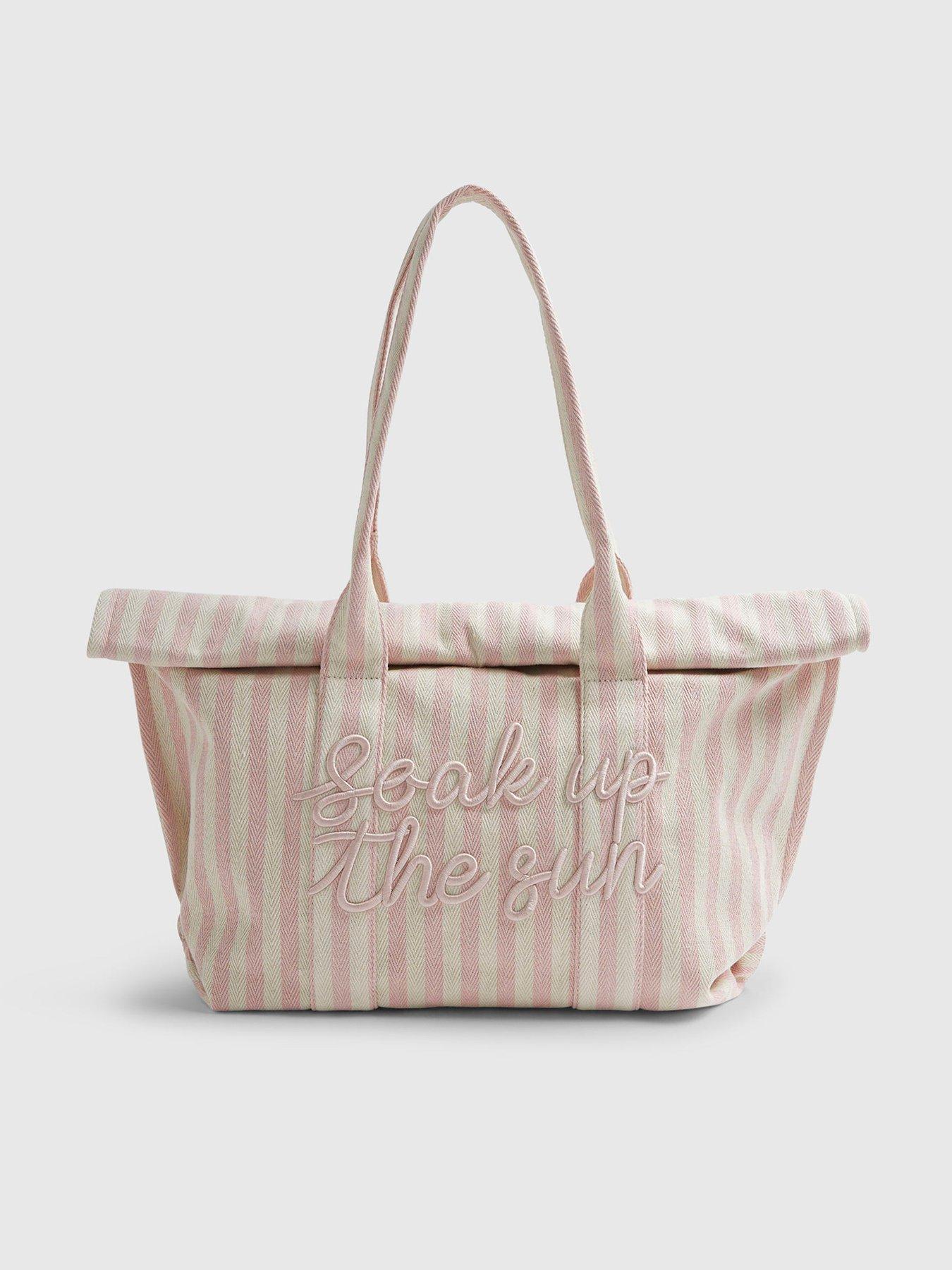 Image 1 of 4 of River Island Striped Soak Up The Sun Roll Top Bag