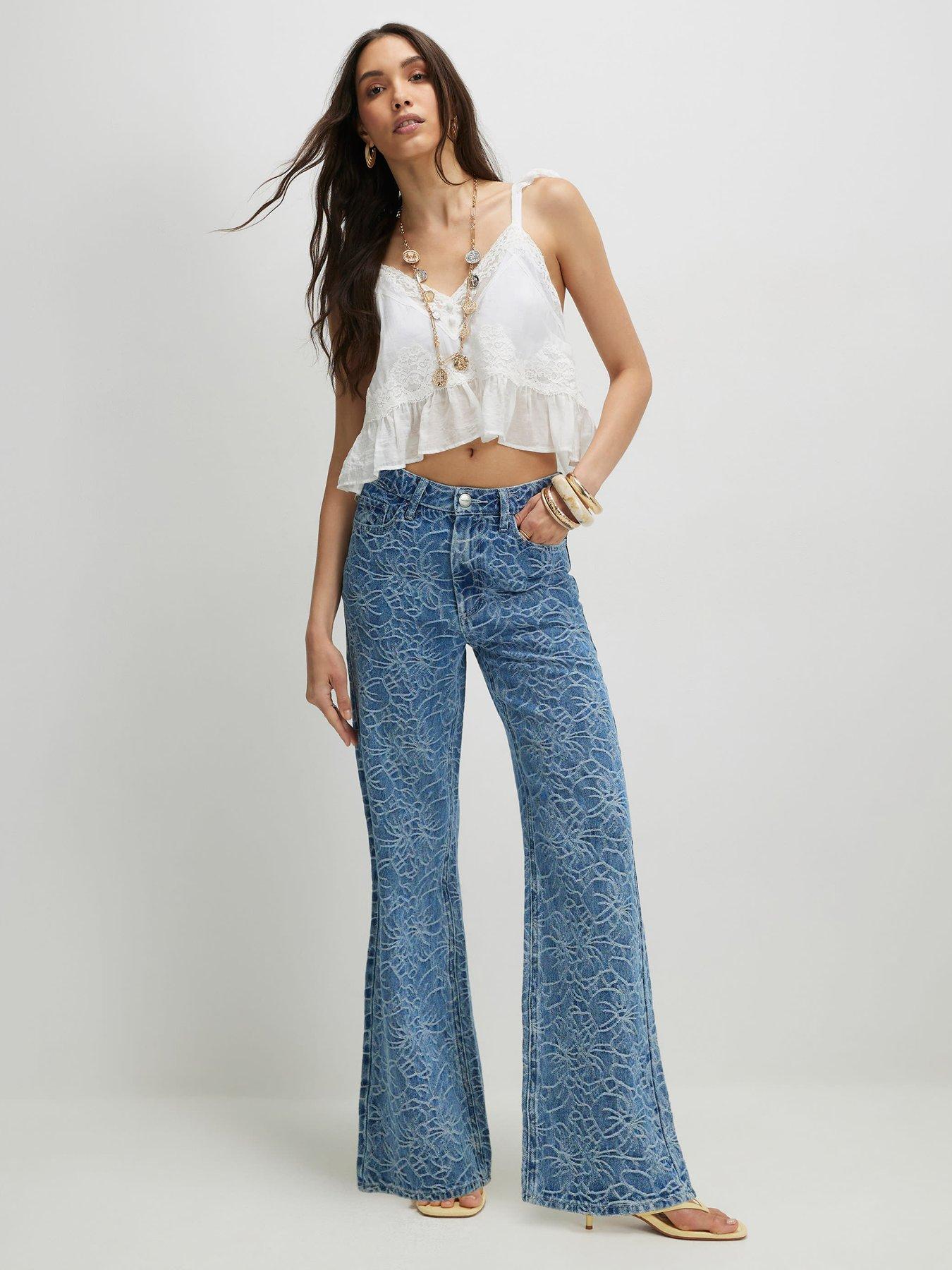 Image 1 of 4 of River Island Floral Print Relaxed Straight Jeans - Blue