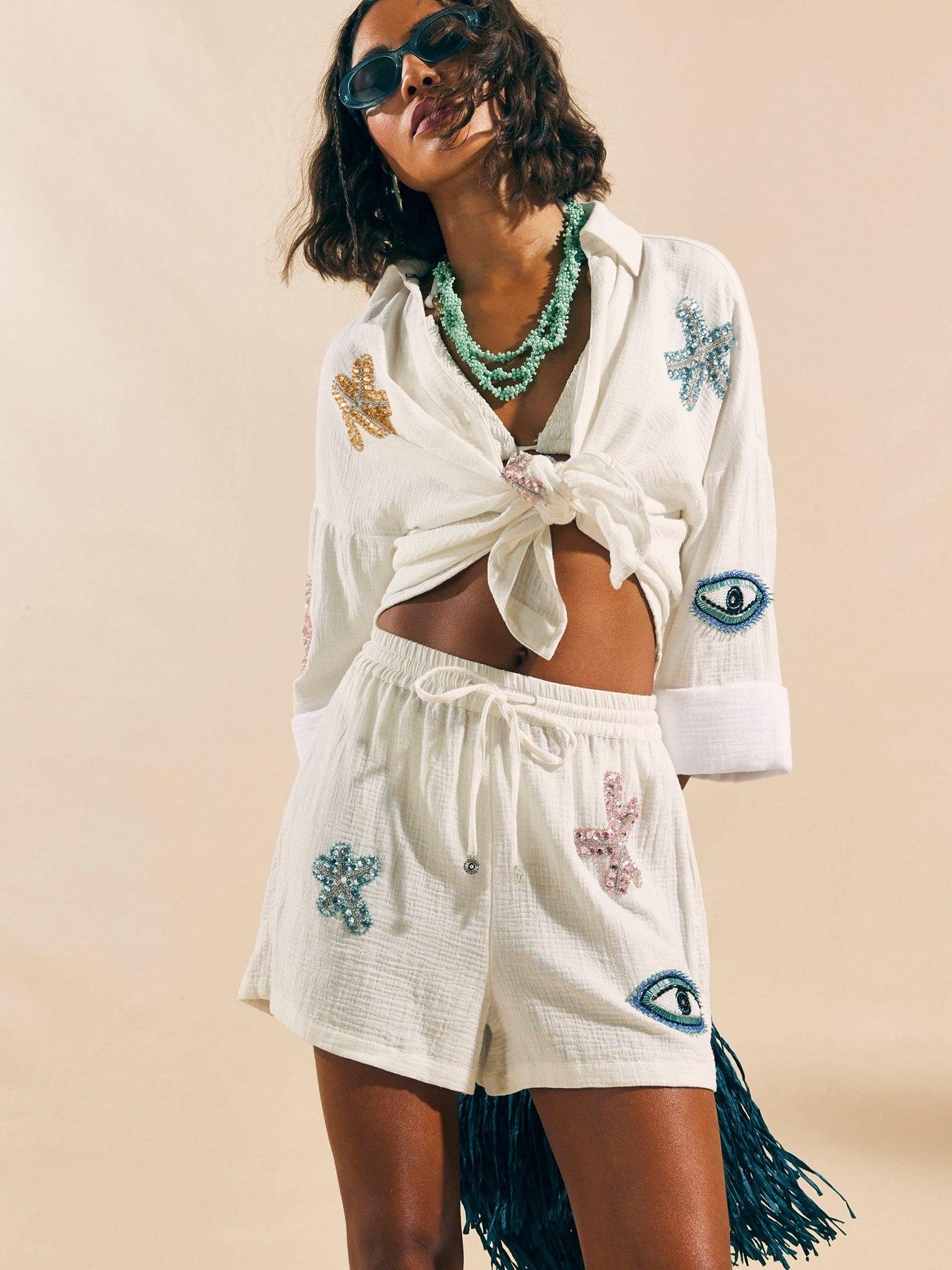 Image 1 of 4 of River Island Embellished Beach Shorts - White