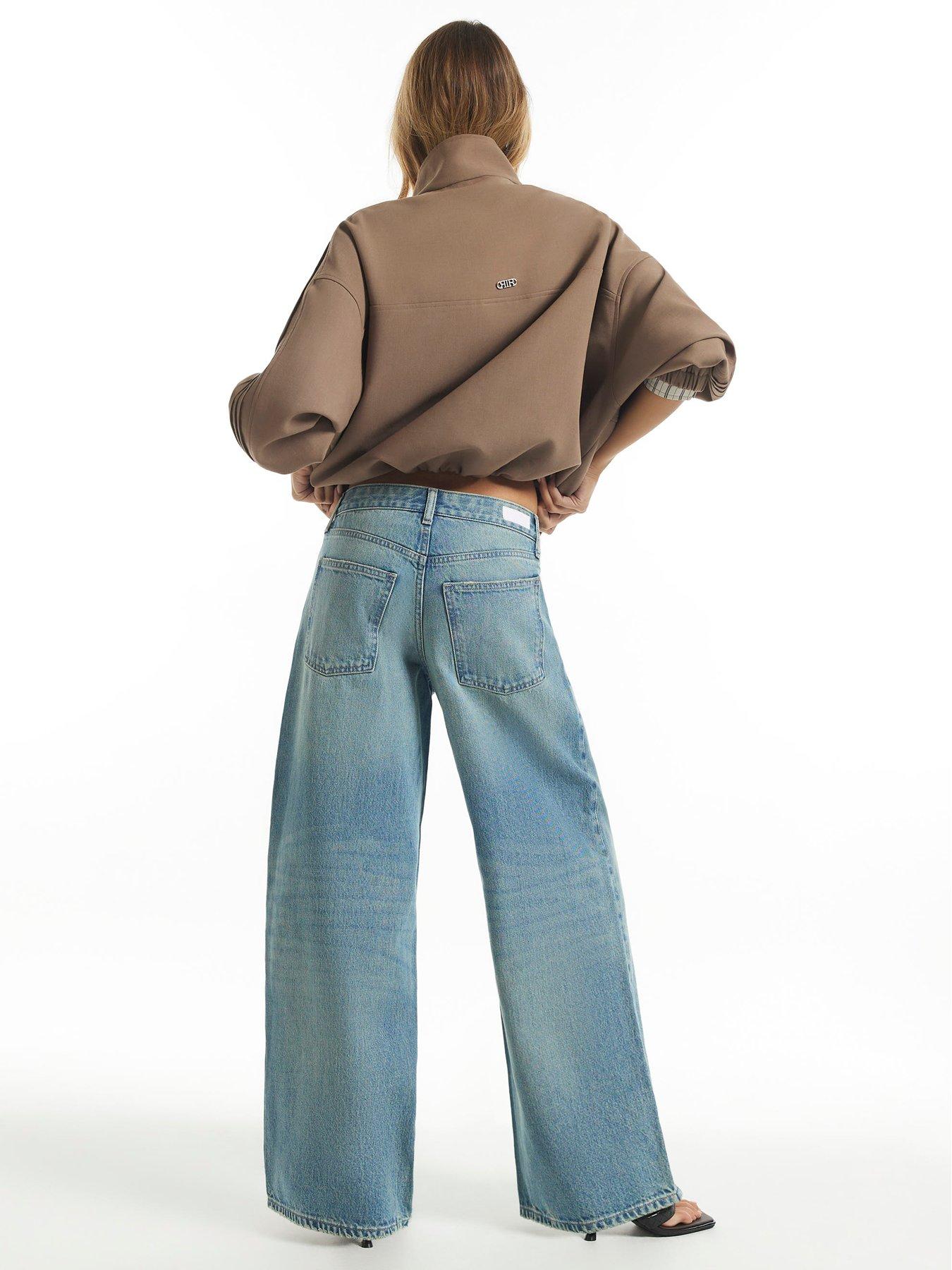 Image 2 of 4 of River Island Washed Asymmetric Fly Barrel Leg Jeans