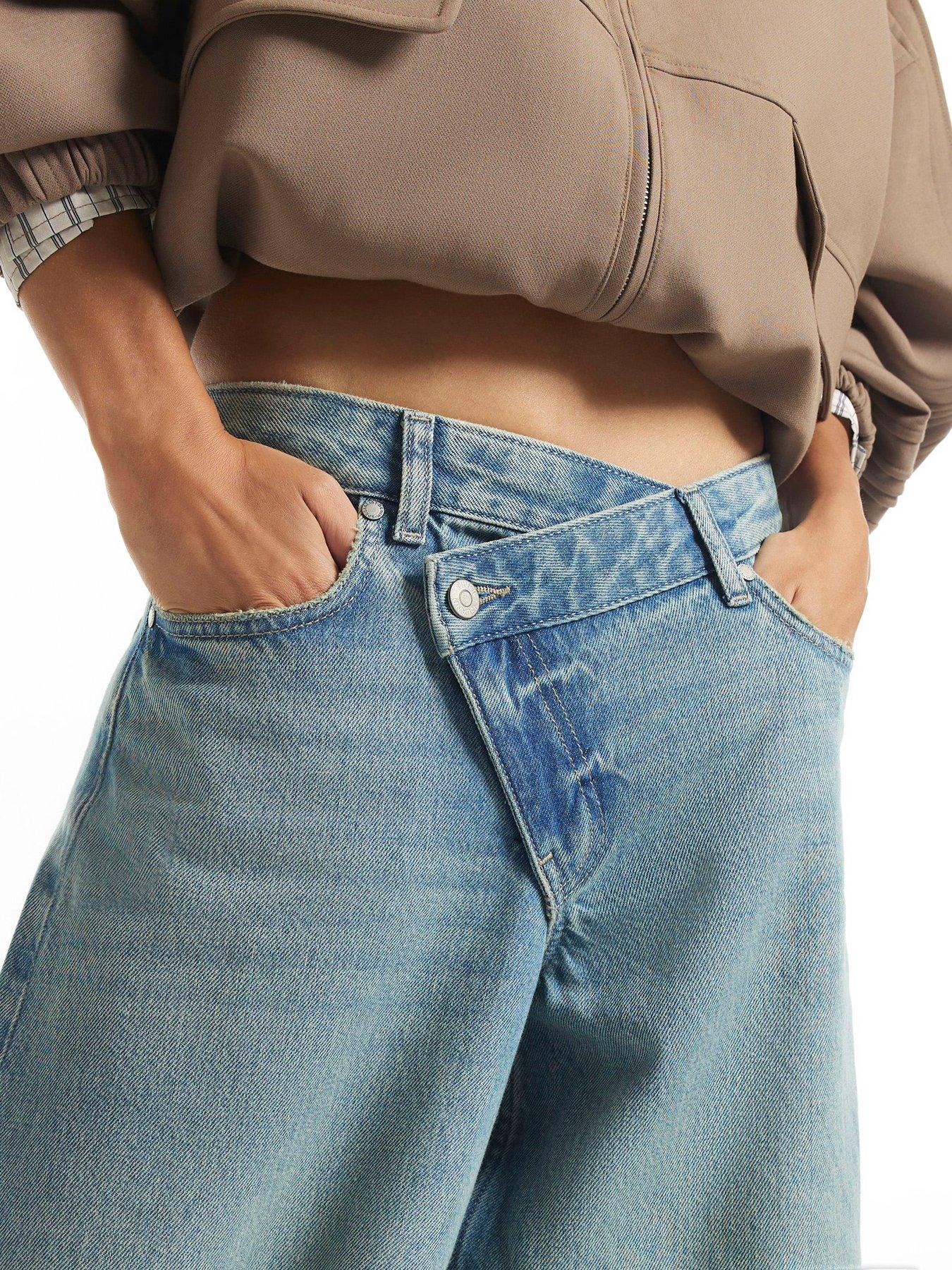 Image 4 of 4 of River Island Washed Asymmetric Fly Barrel Leg Jeans