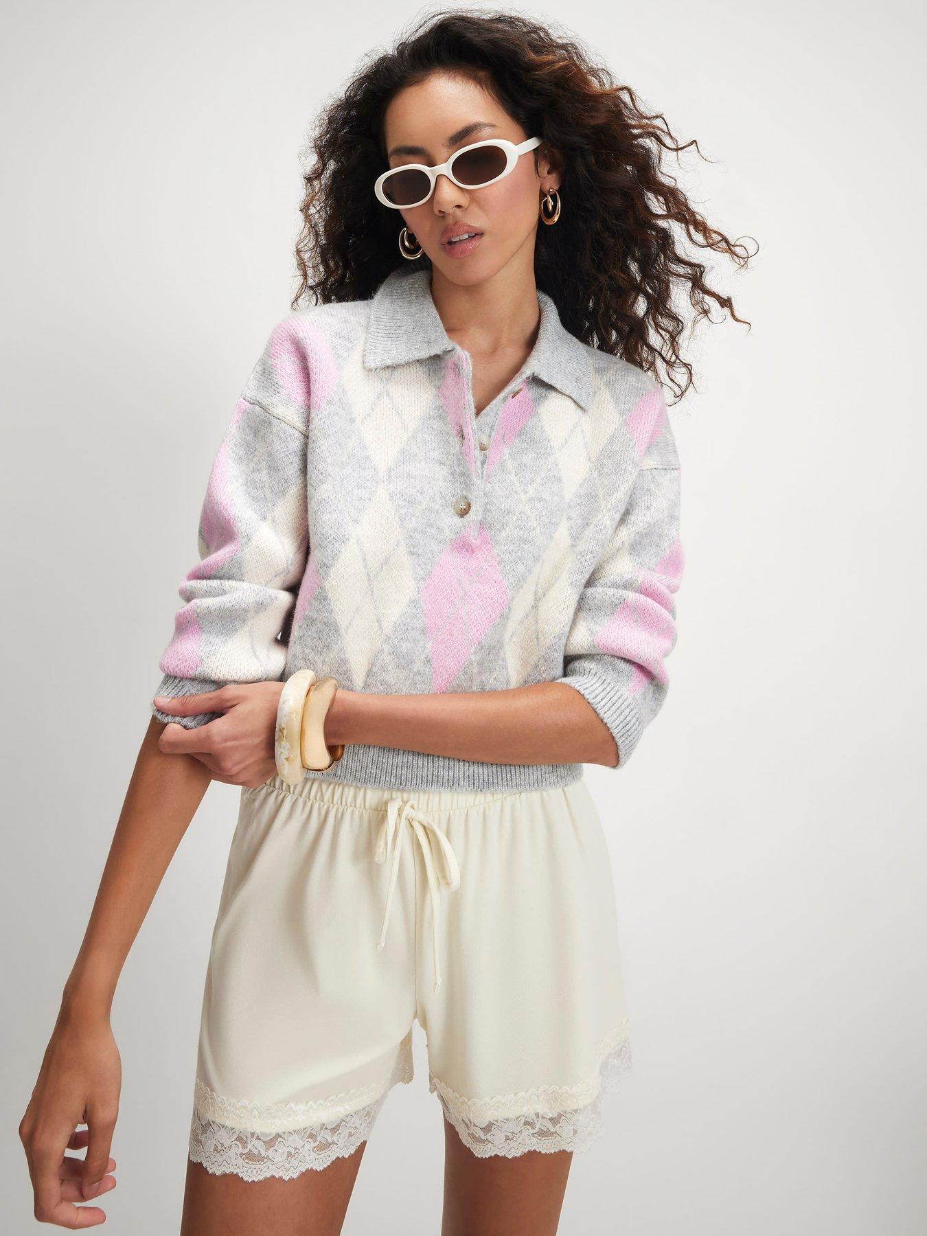 Image 1 of 3 of River Island Argyle Knit Polo Neck Jumper - Pink