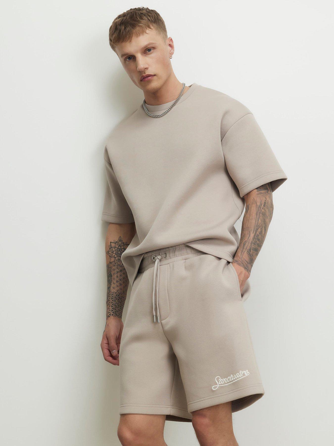 Image 1 of 4 of River Island Premium Regular Fit Sanctuaire Shorts - Natural