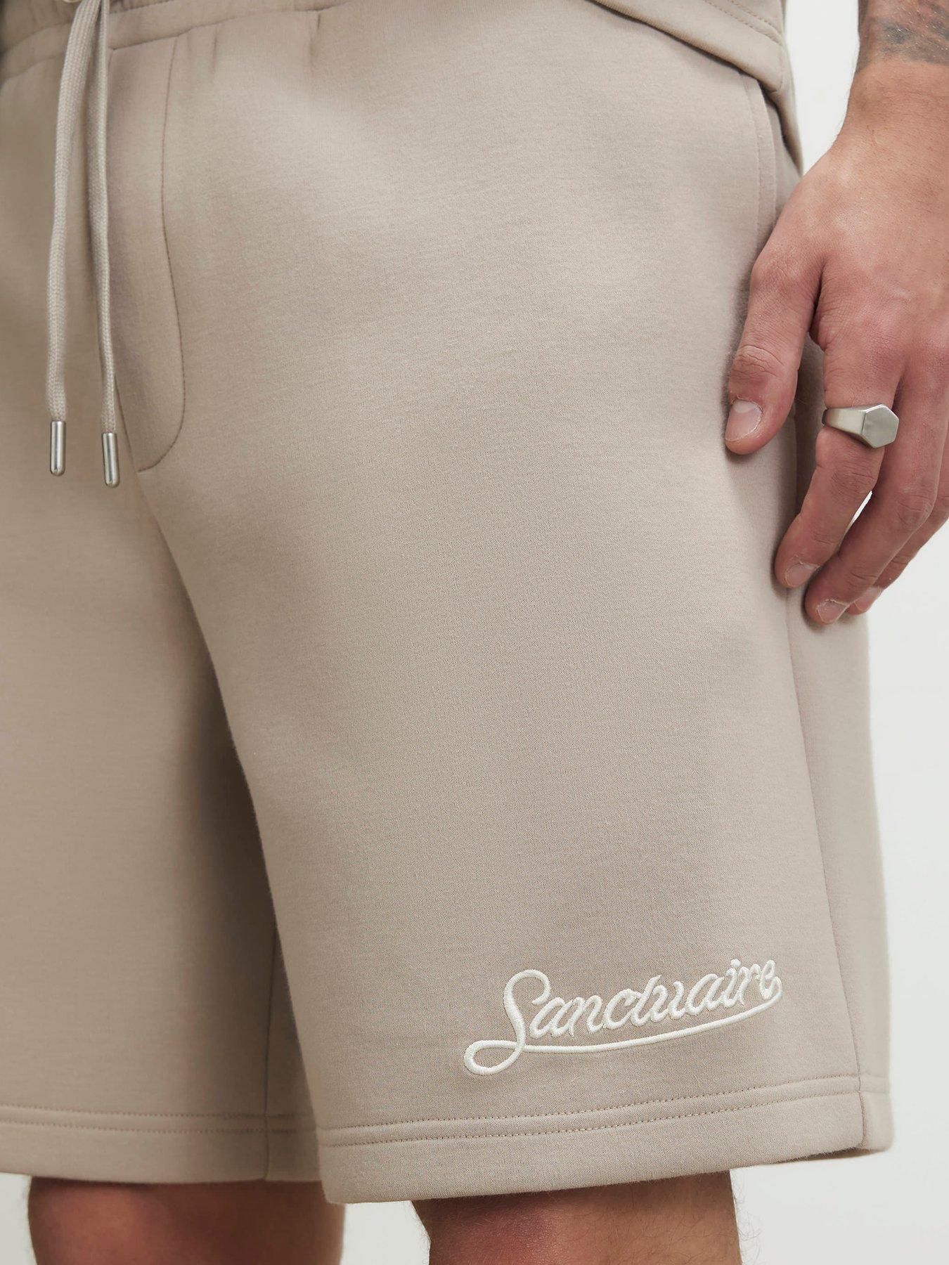Image 4 of 4 of River Island Premium Regular Fit Sanctuaire Shorts - Natural