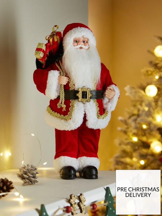 stillFront image of traditional-standing-santa-christmas-decoration