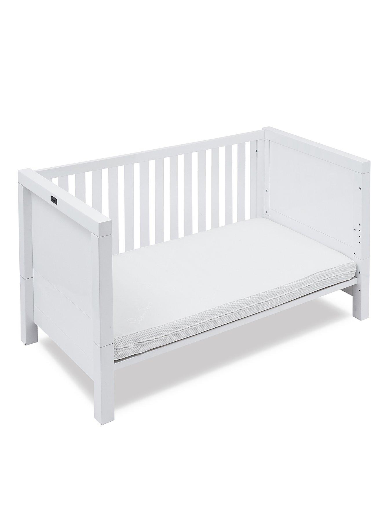 cribs with solid back panel