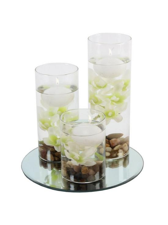 stillFront image of hestia-set-of-3-floating-candles-with-vases-and-white-flowers-on-a-mirrored-base