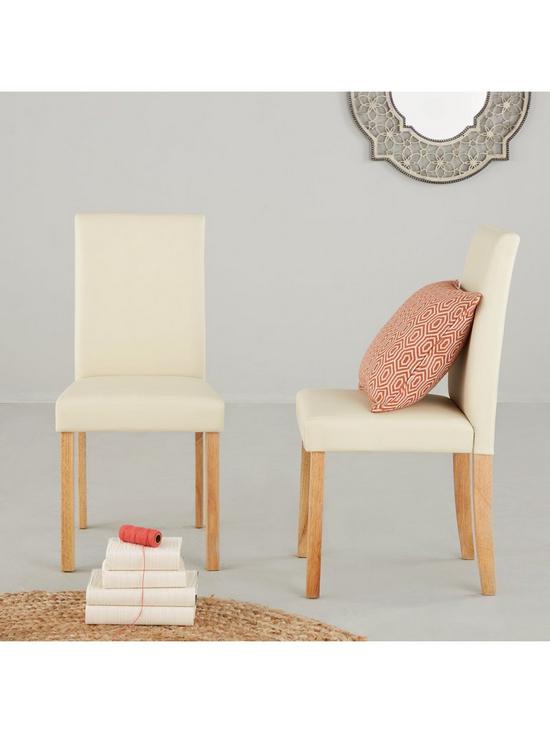 stillFront image of pair-of-lucca-faux-leather-dining-chairs