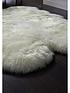  image of luxe-collection-genuine-sheepskin-wool-rug-quad