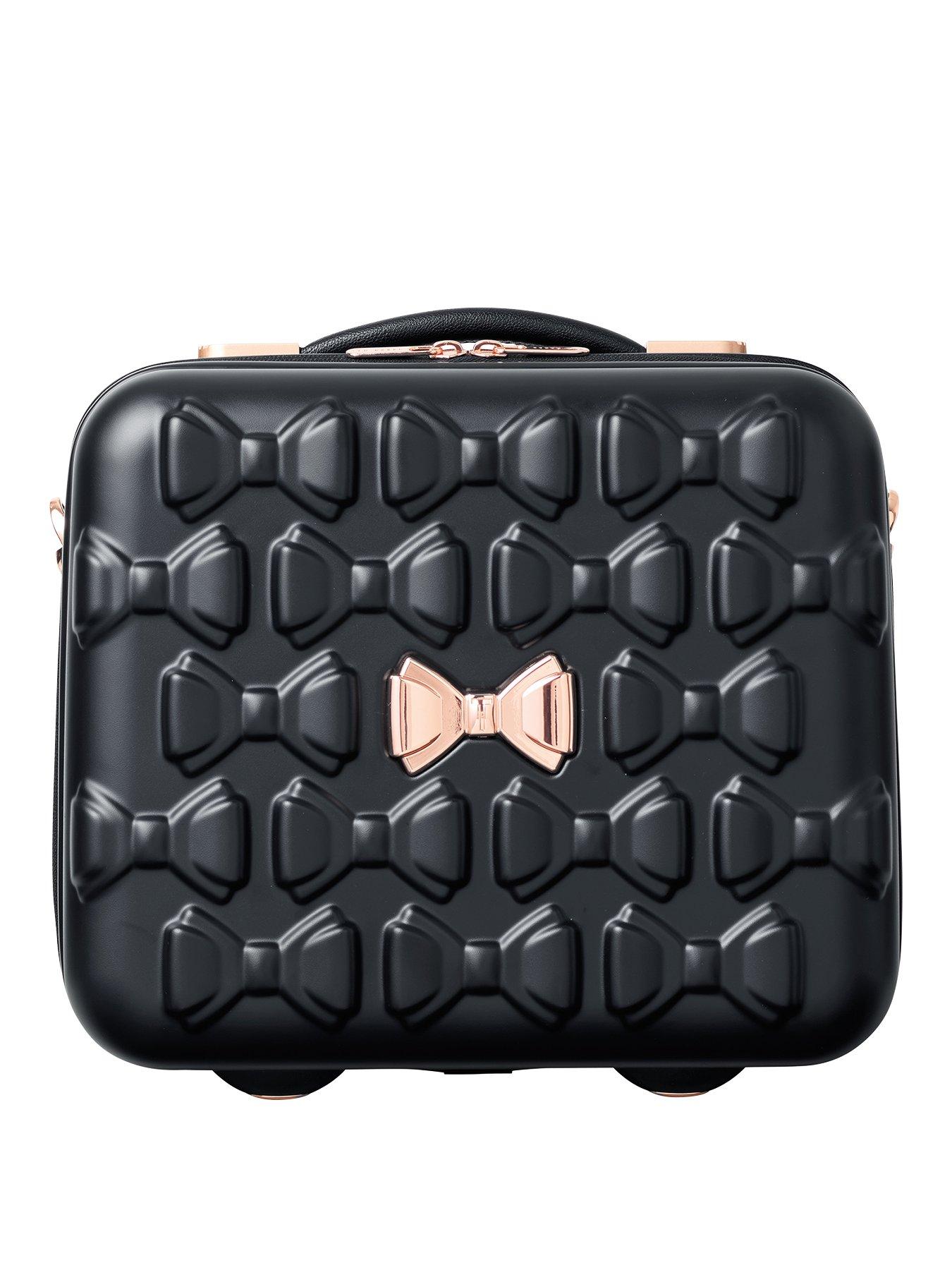 white ted baker suitcase