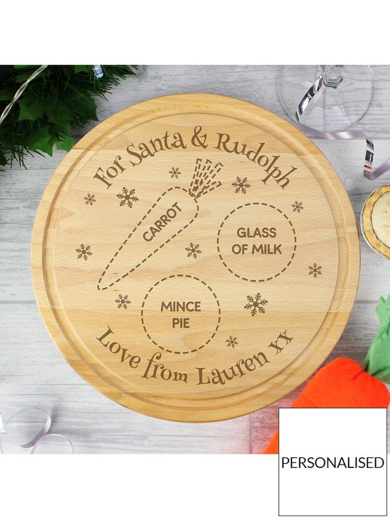 stillFront image of the-personalised-memento-company-personalised-christmas-eve-round-treats-board