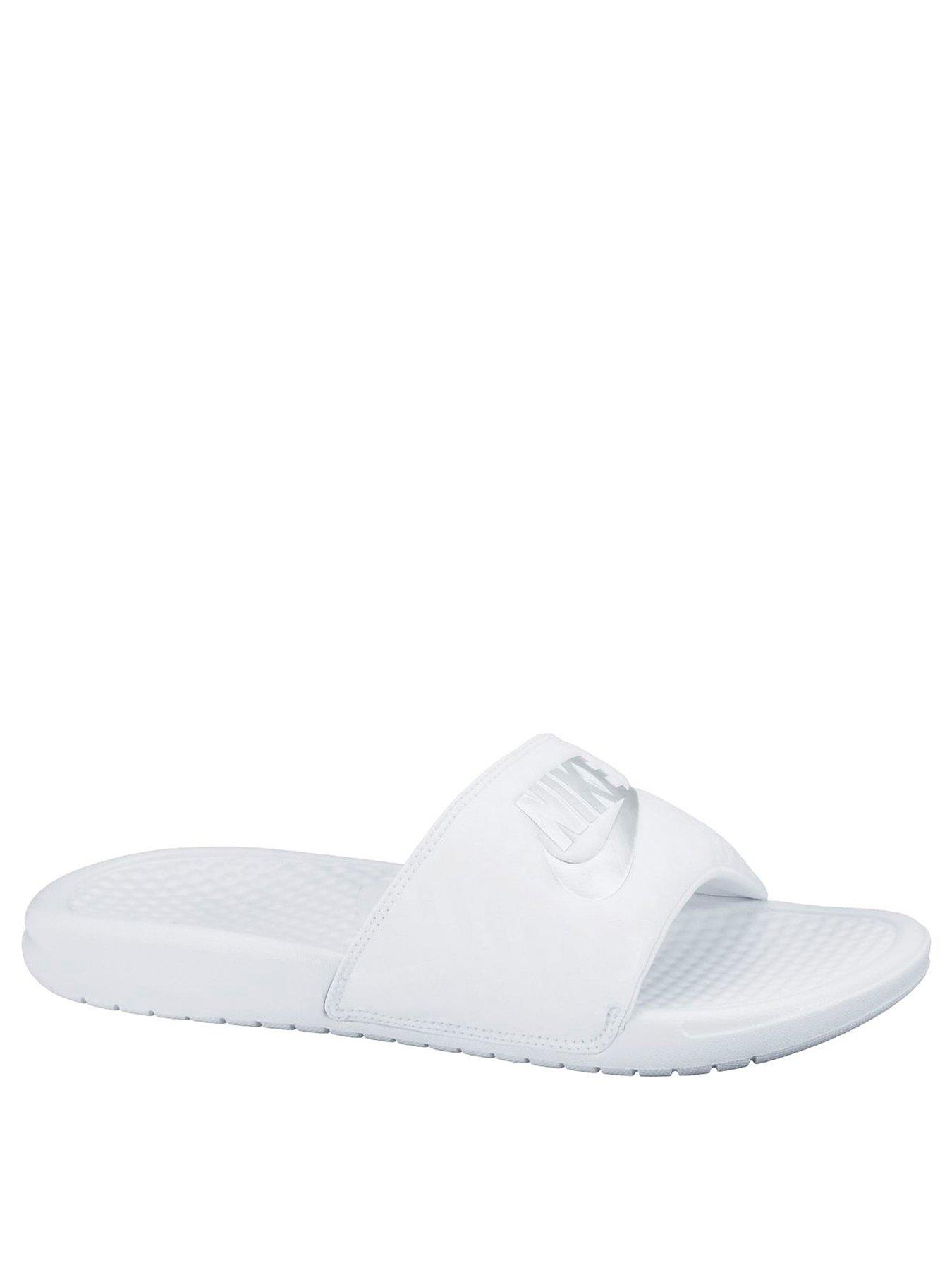 all white nike flip flops