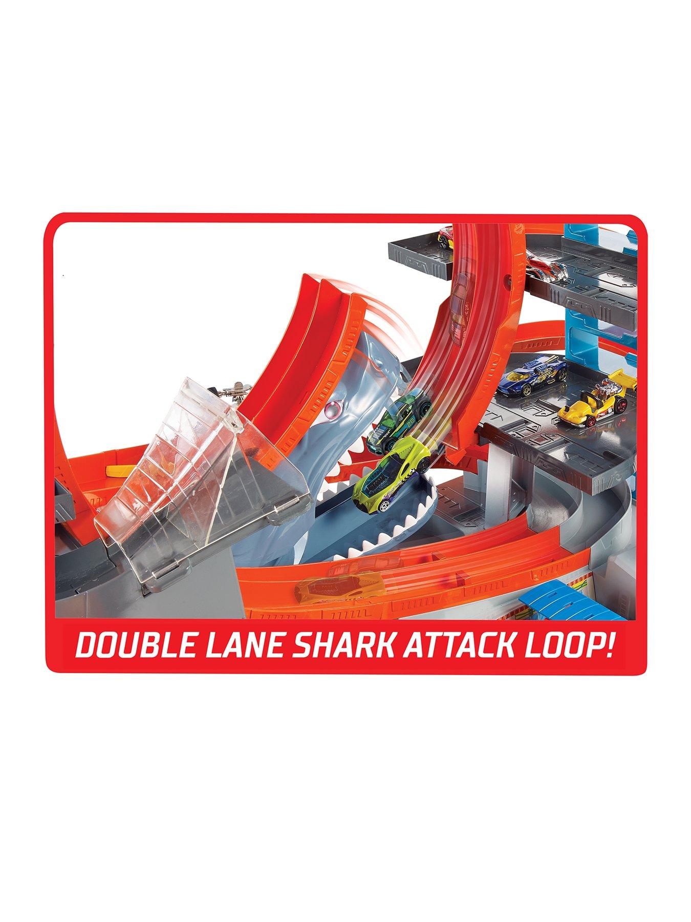 hot wheels city ultimate garage playset with automatic lift jump loop shark attack