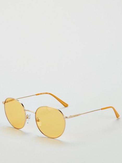 calvin-klein-round-maize-sunglasses