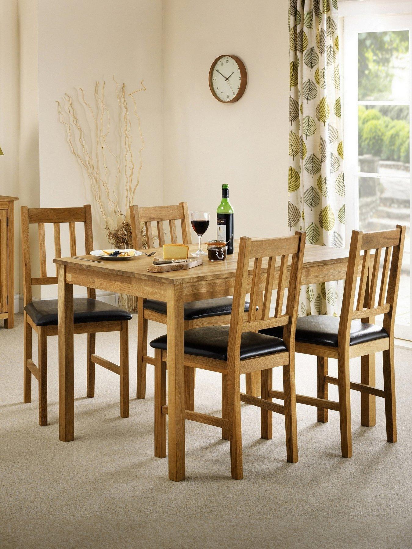 Image 1 of 4 of Julian Bowen Coxmoor 118 cm Solid Oak Dining Table + 4 Chairs