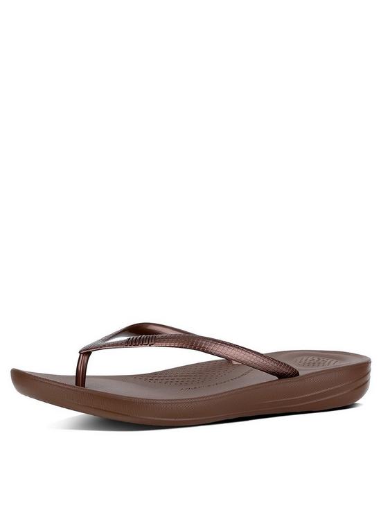 front image of fitflop-iqushion-ergonomic-toe-thong-flip-flop-shoes-bronze
