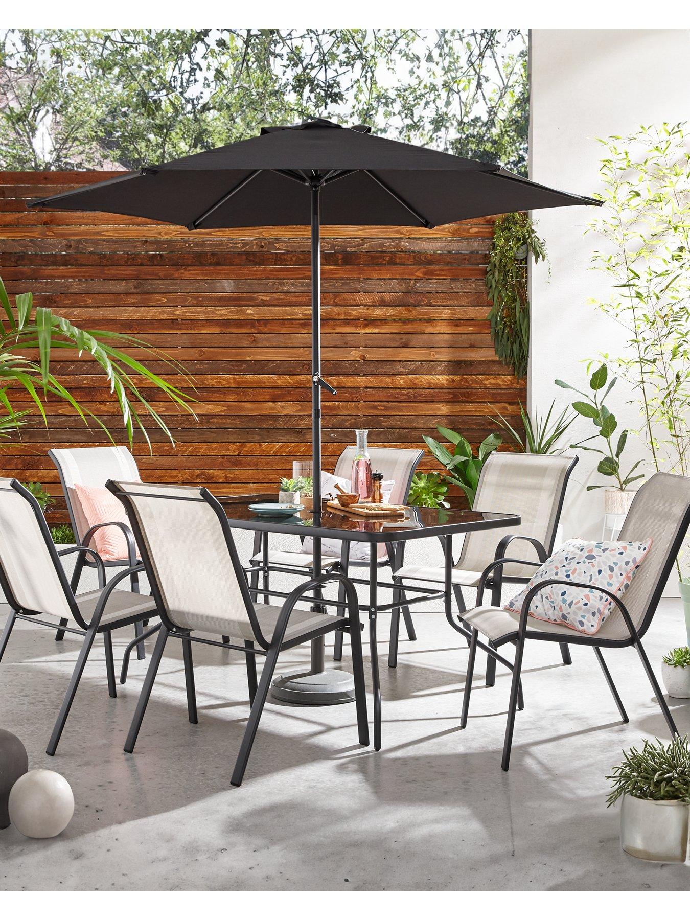 Littlewoods table shop and chairs