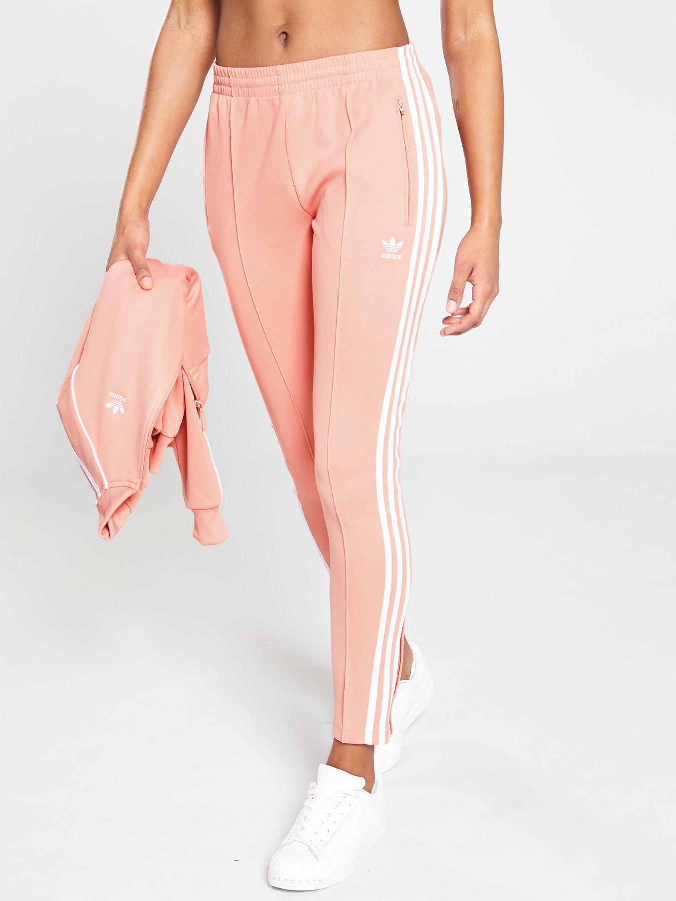 adidas original three stripe track pant with vintage logo in pink