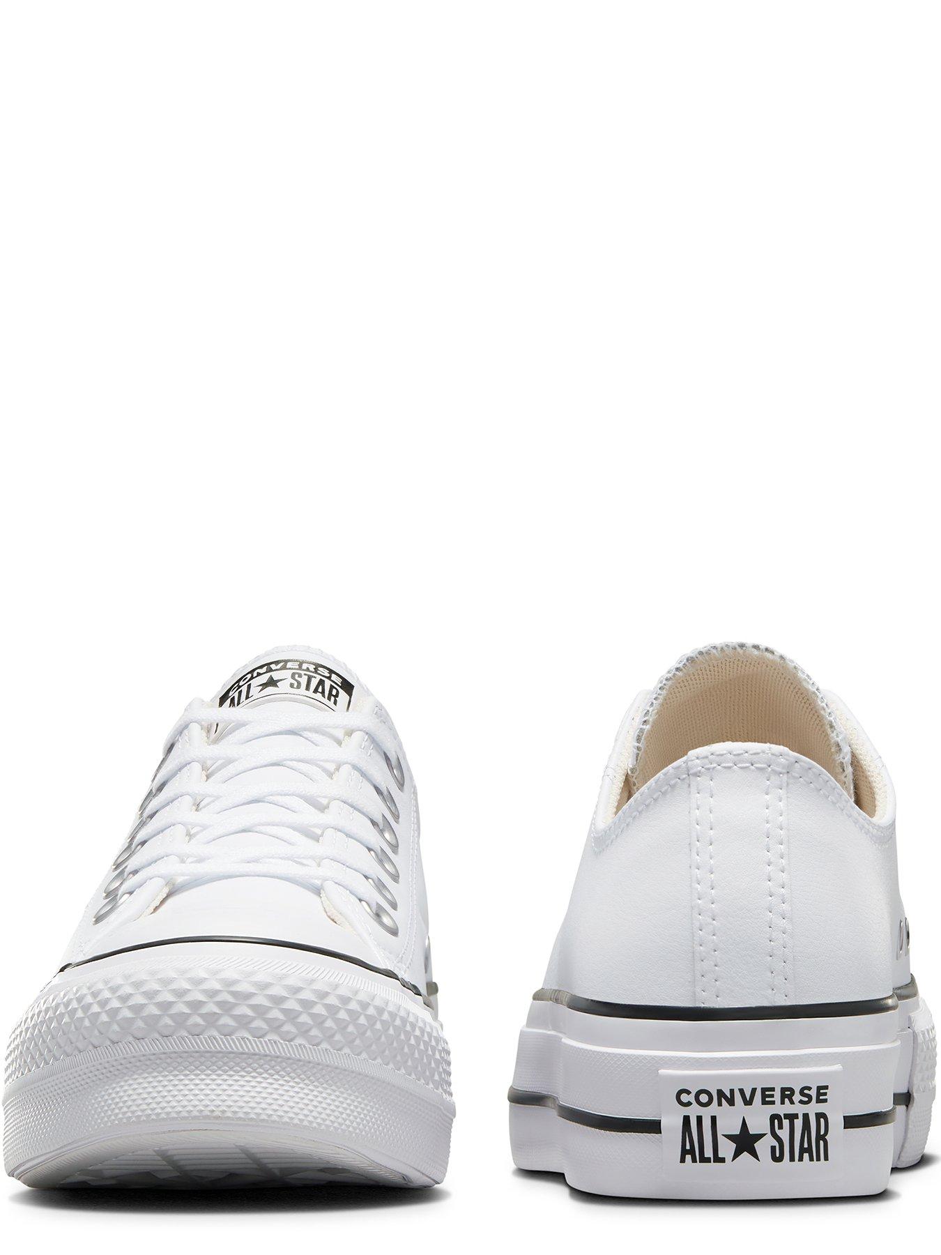 white leather converse lift