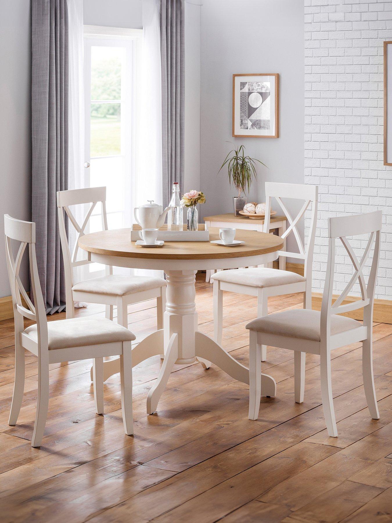 Cream round extending dining deals table and chairs