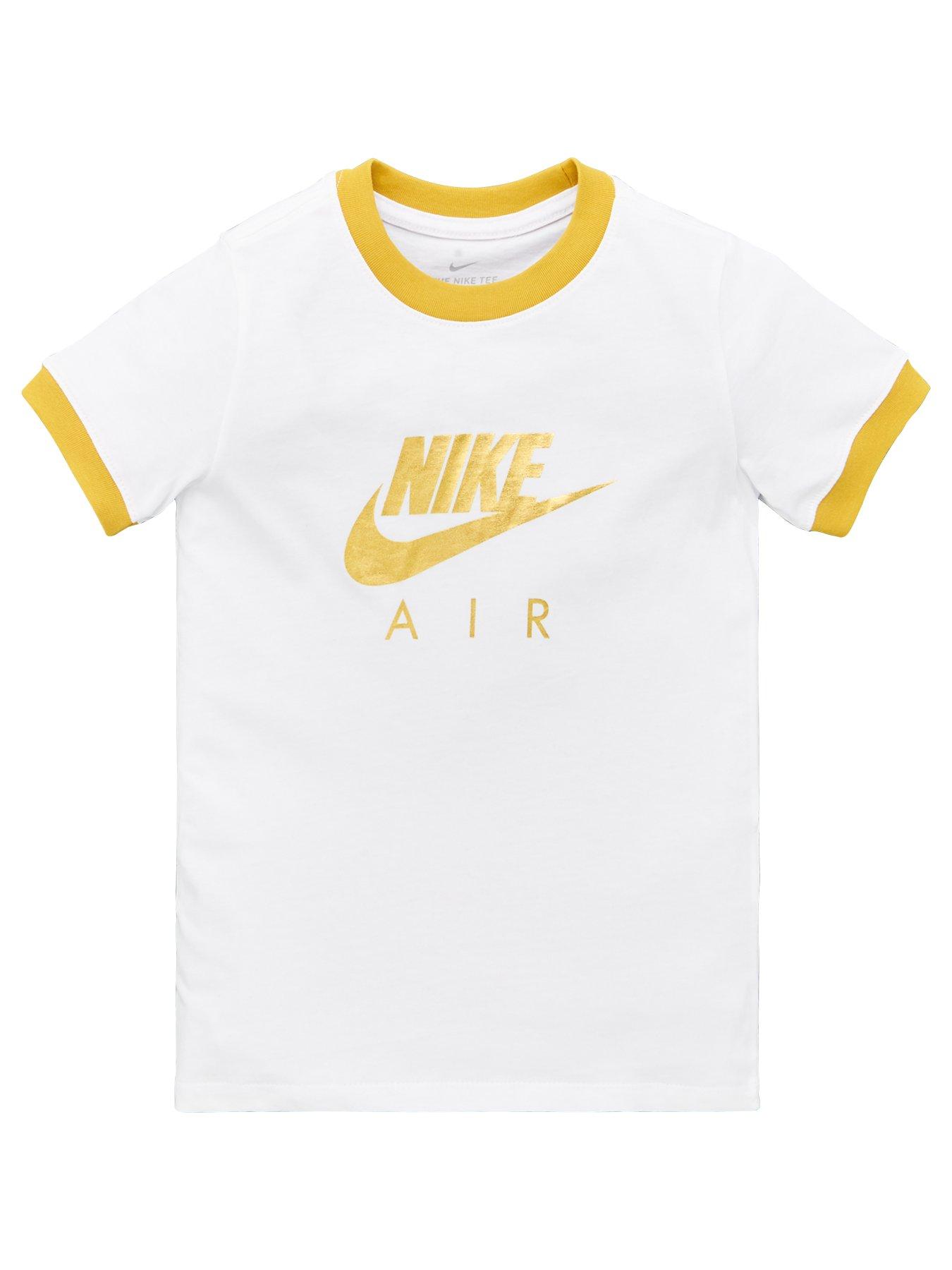 white and gold nike shirt