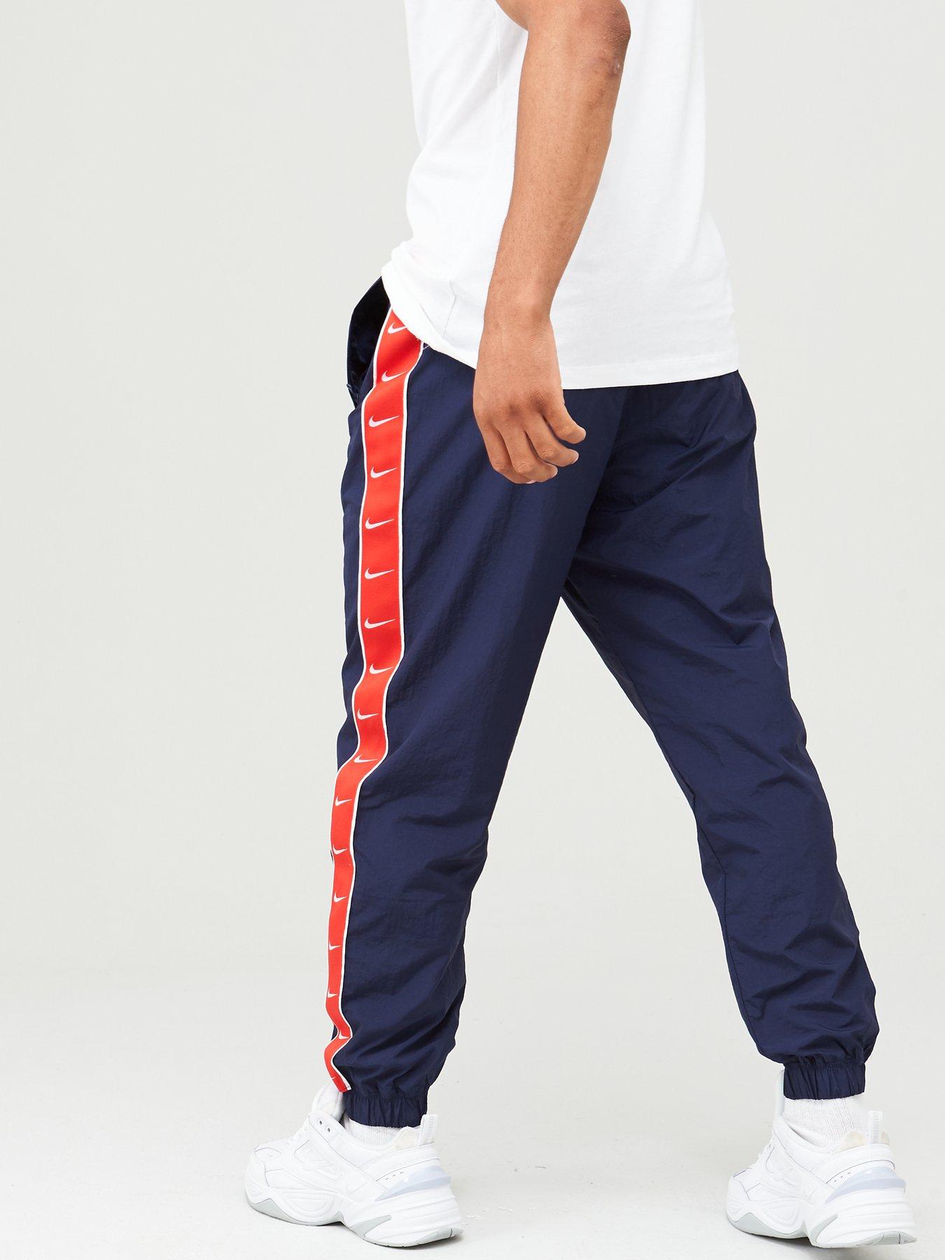 nike black swoosh woven joggers