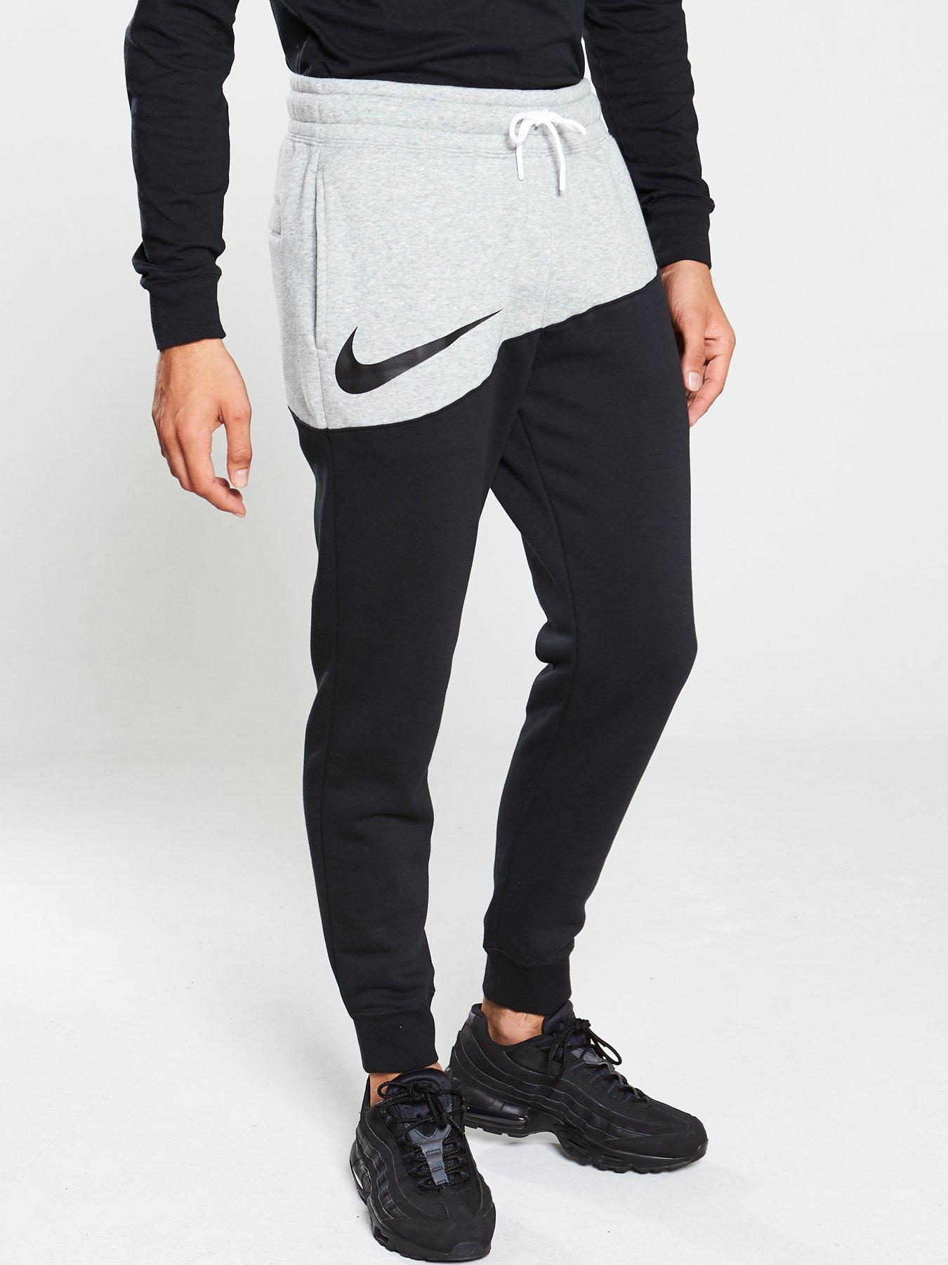 grey and black nike joggers