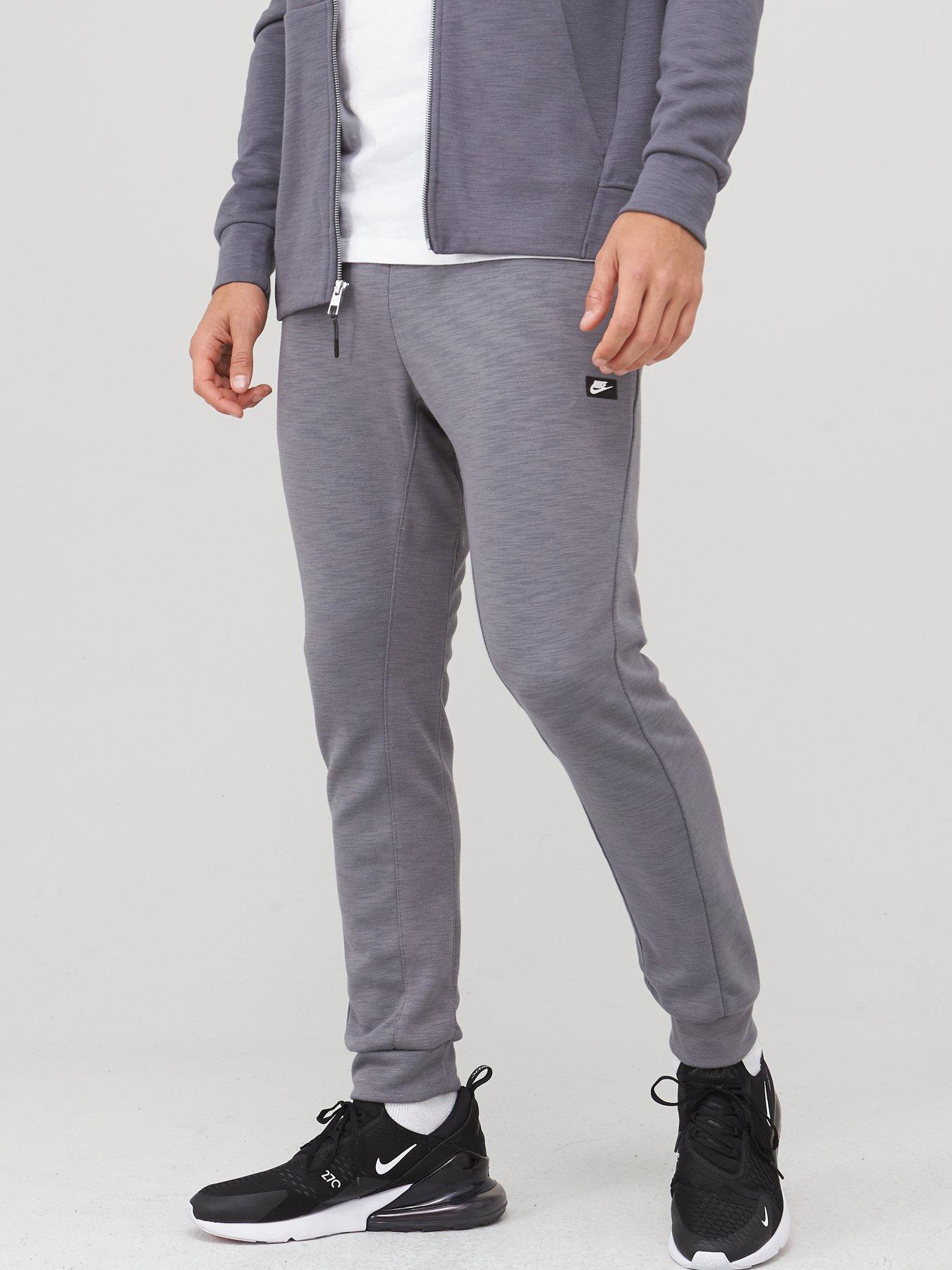 nike joggers with zipper pockets