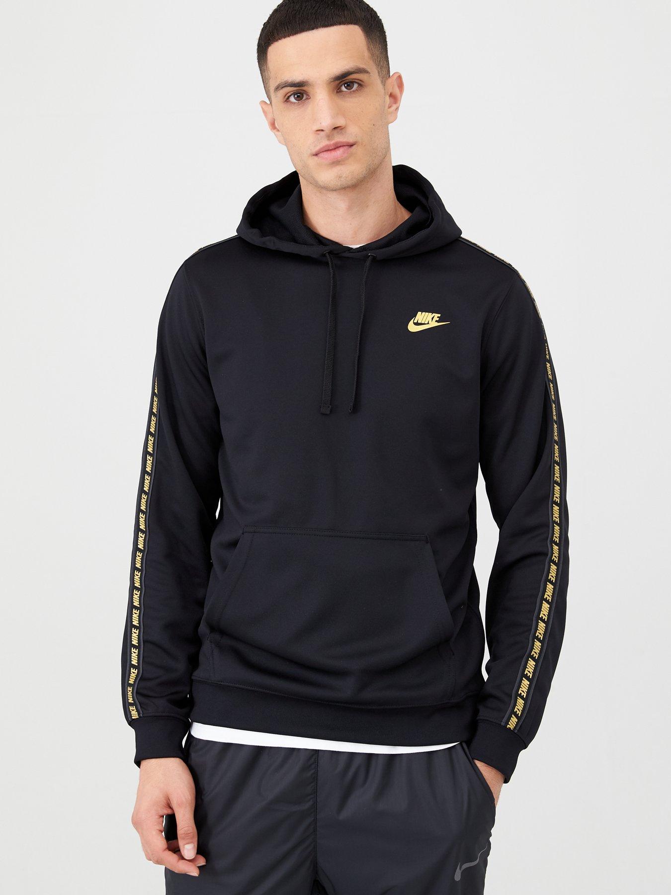 black and gold tracksuit nike