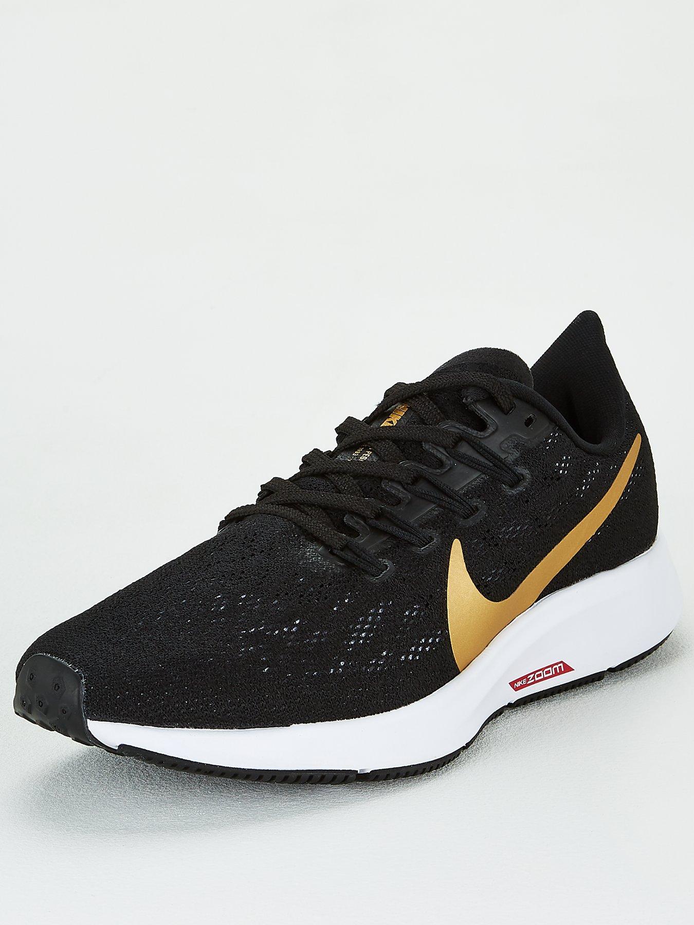 nike pegasus black gold