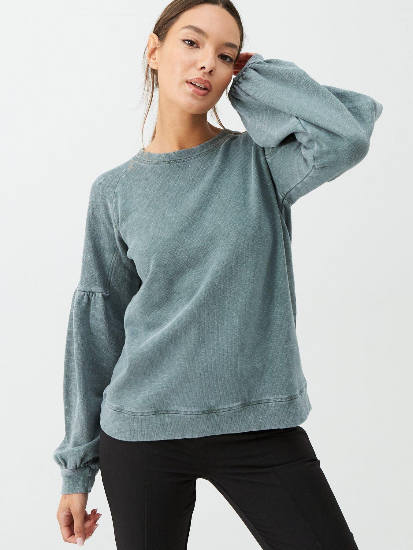 pale green sweatshirt