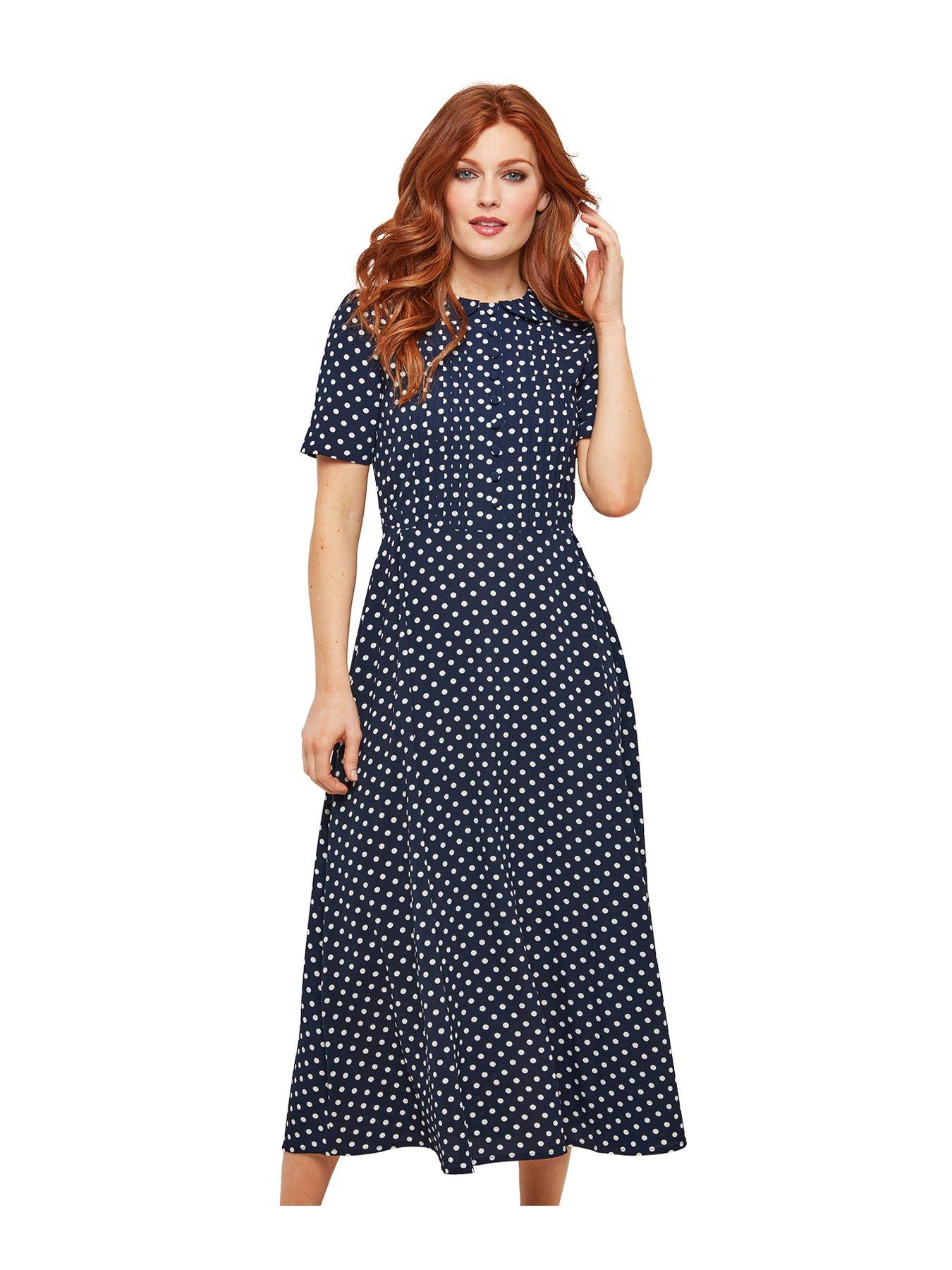 navy and white polka dot dress