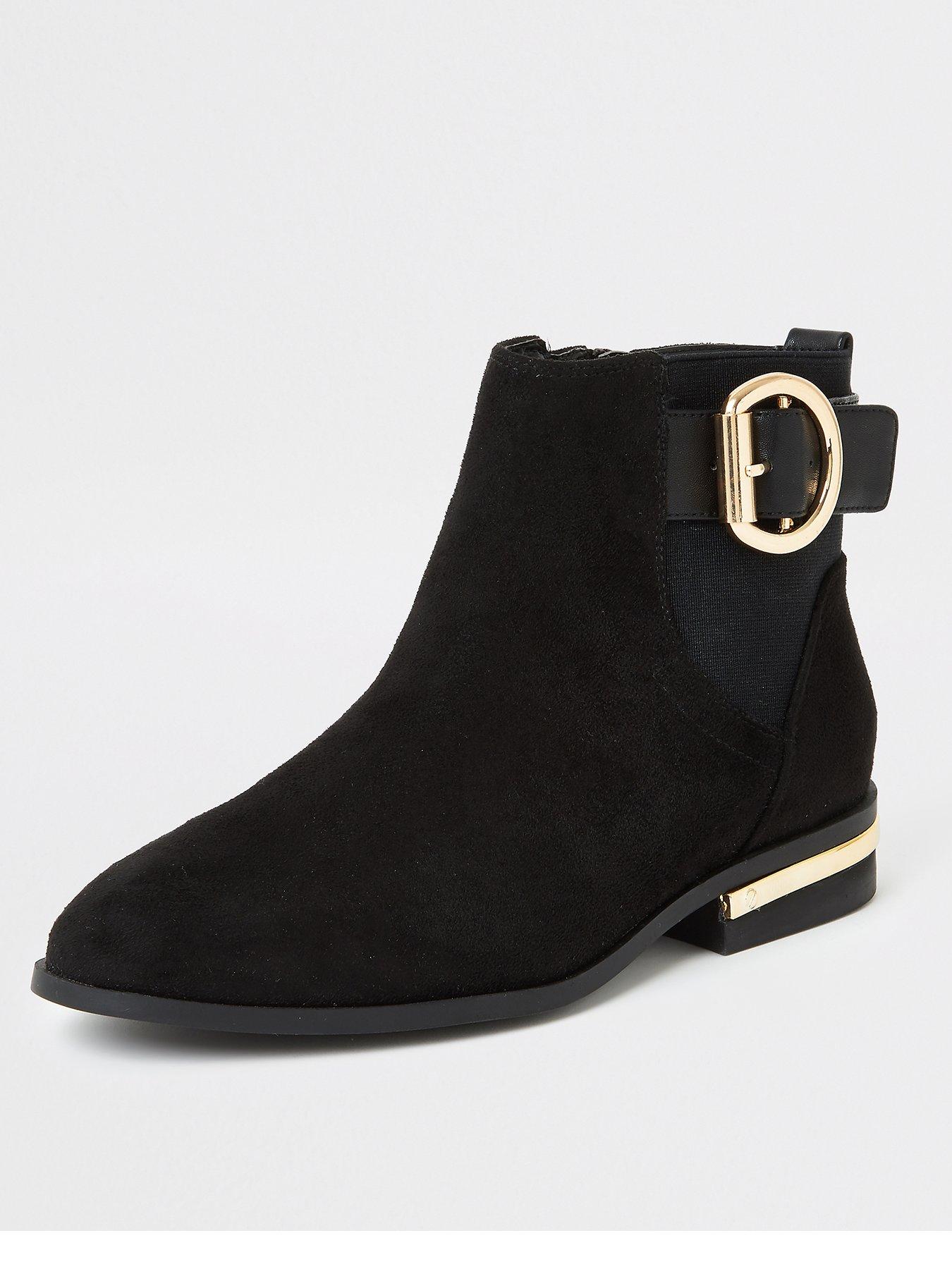 black flat buckle boots