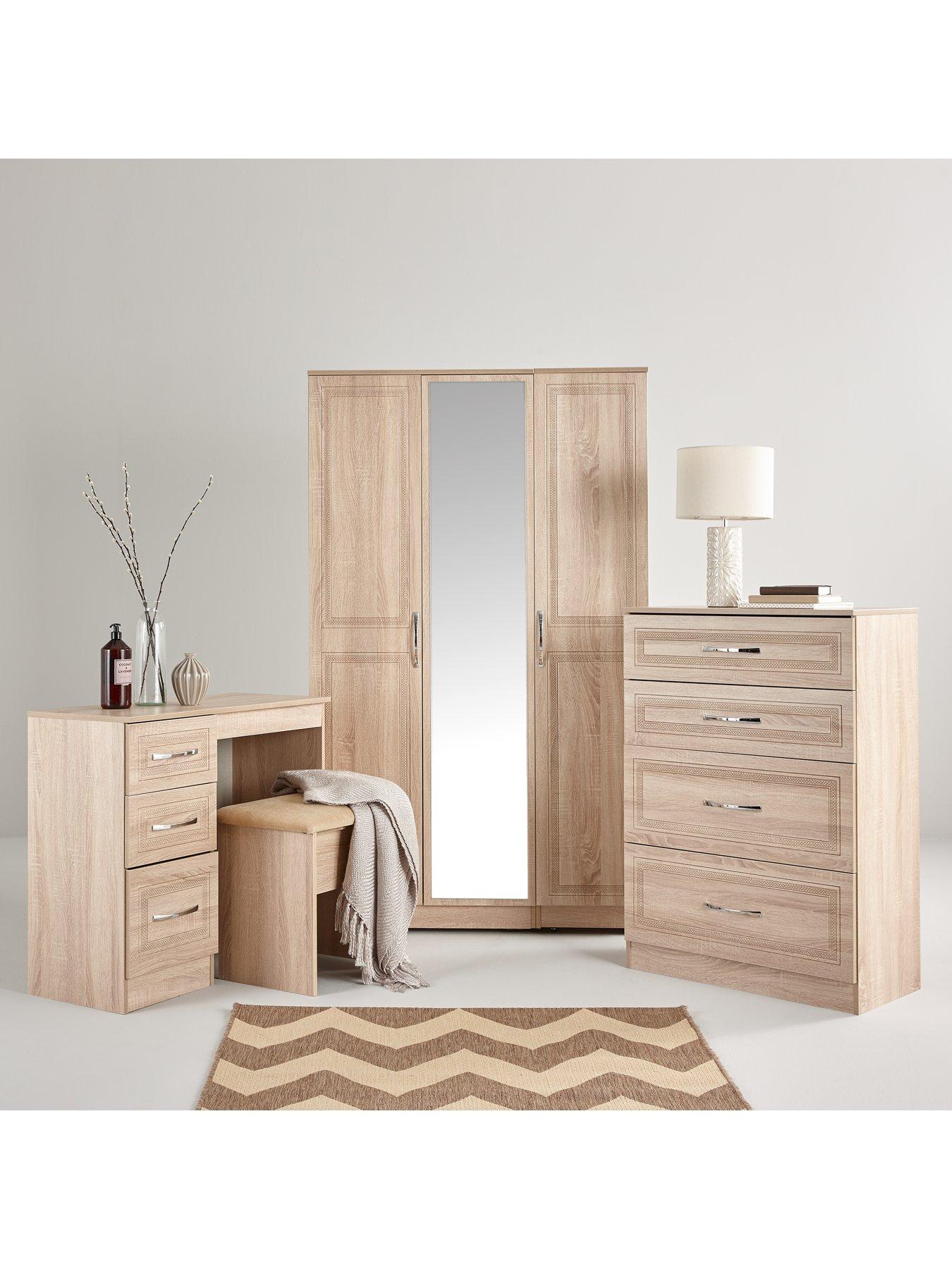 stillFront image of swift-winchester-partnbspassembled-4-piece-package-3-door-mirrored-wardrobe-chest-of-5-drawers-and-2-bedside-chestsnbsp--fscreg-certified