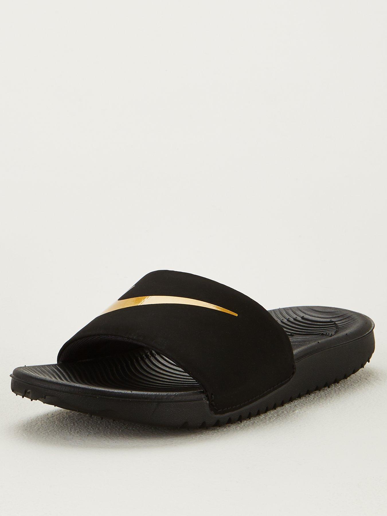 nike kawa slide gold