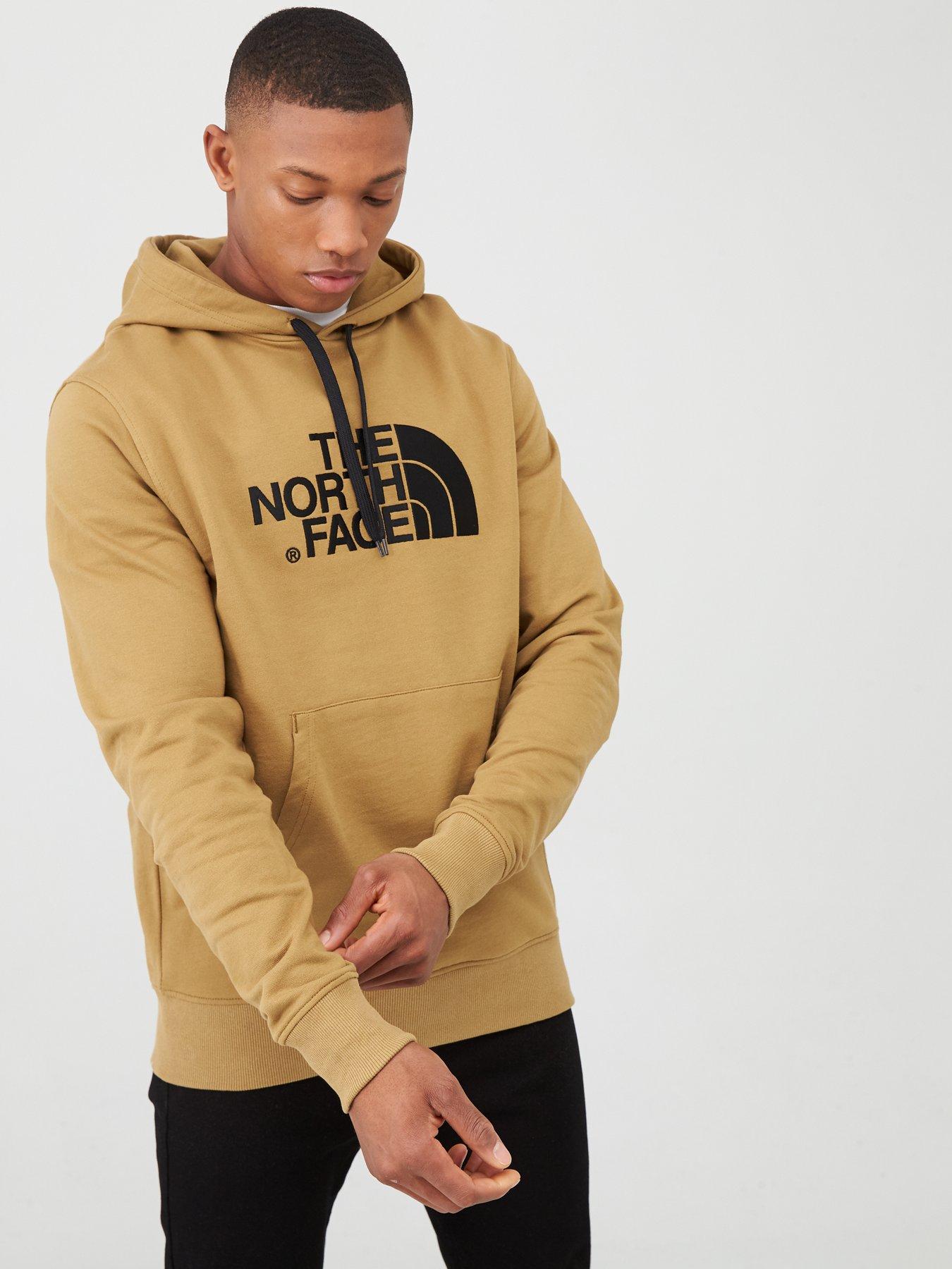 tan north face sweatshirt