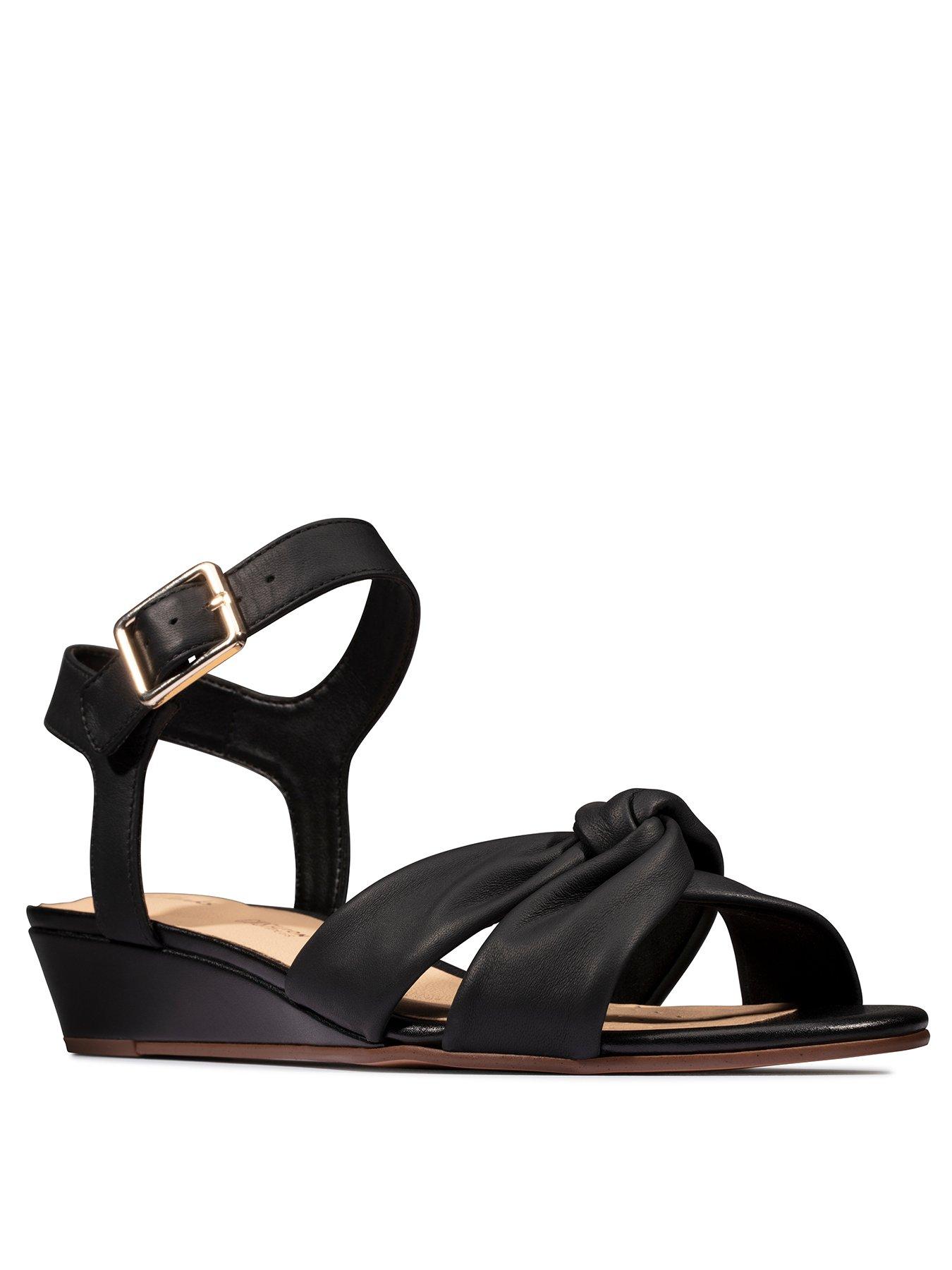 black low wedge sandals