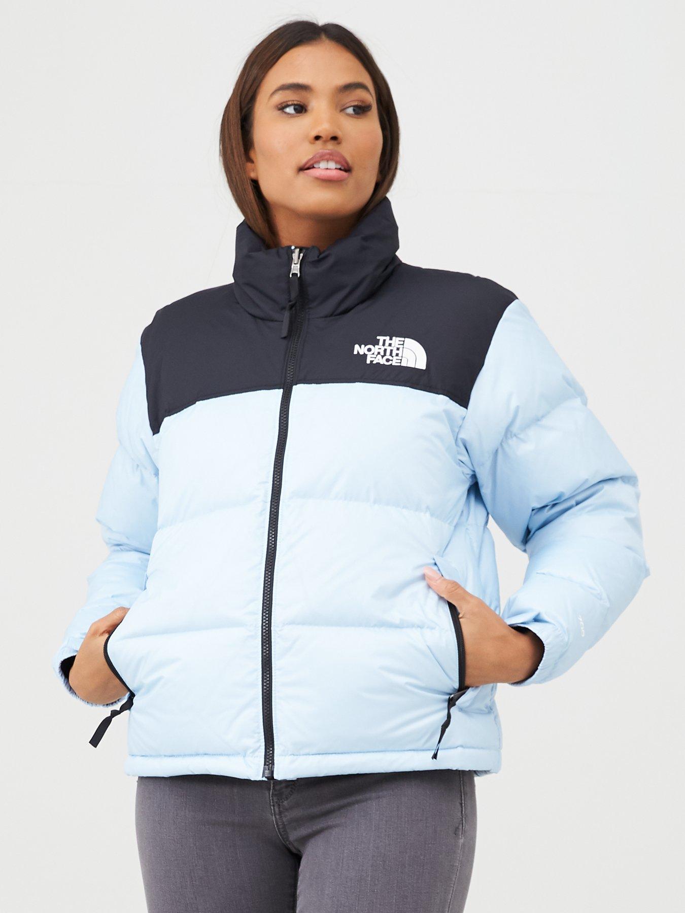 light blue north face jacket