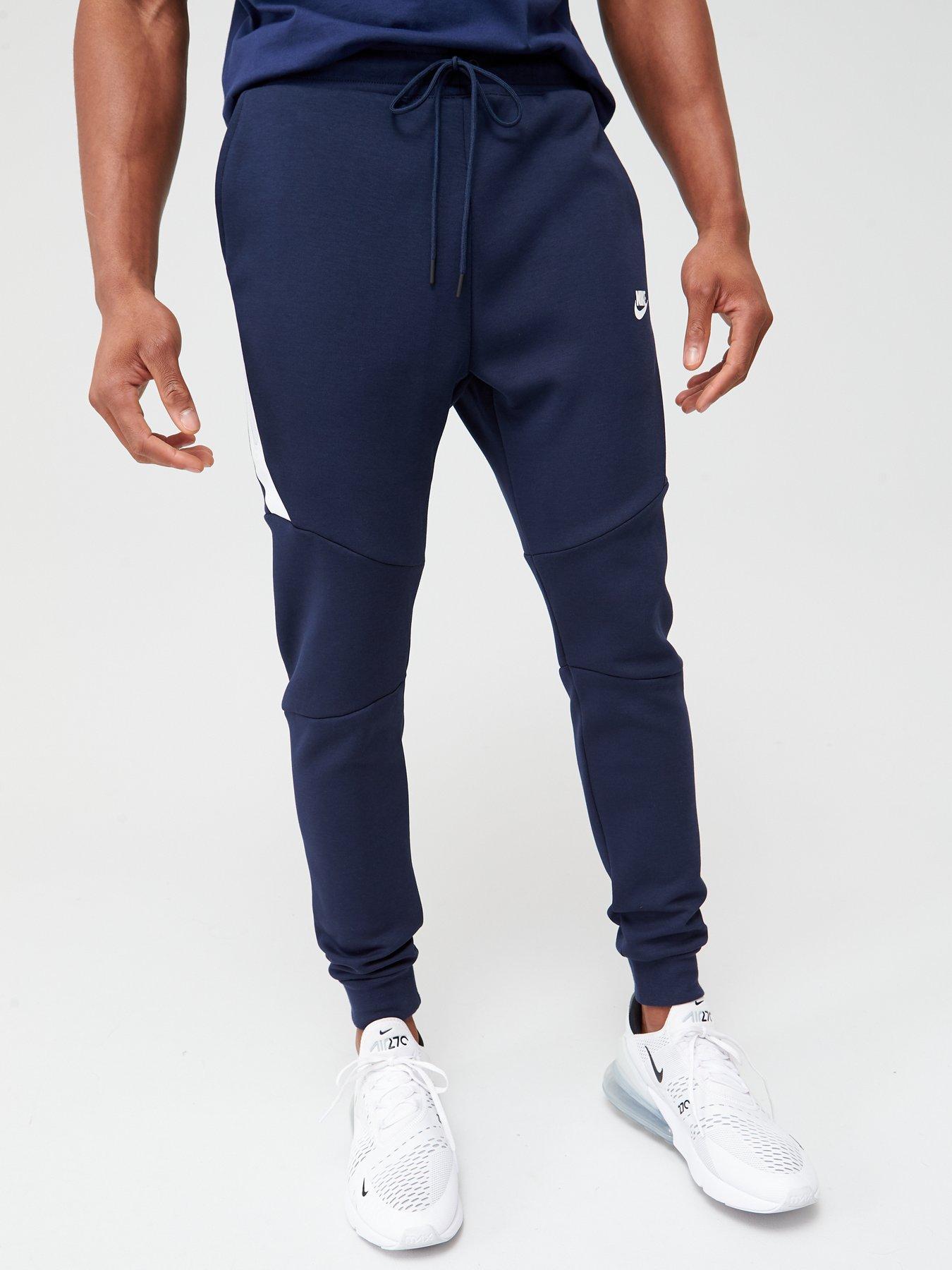 blue nike tech bottoms