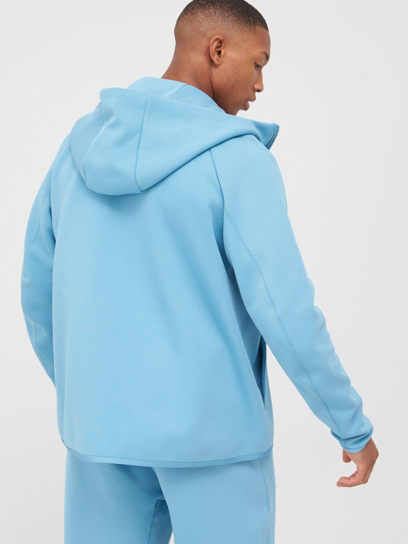 light blue nike tracksuit